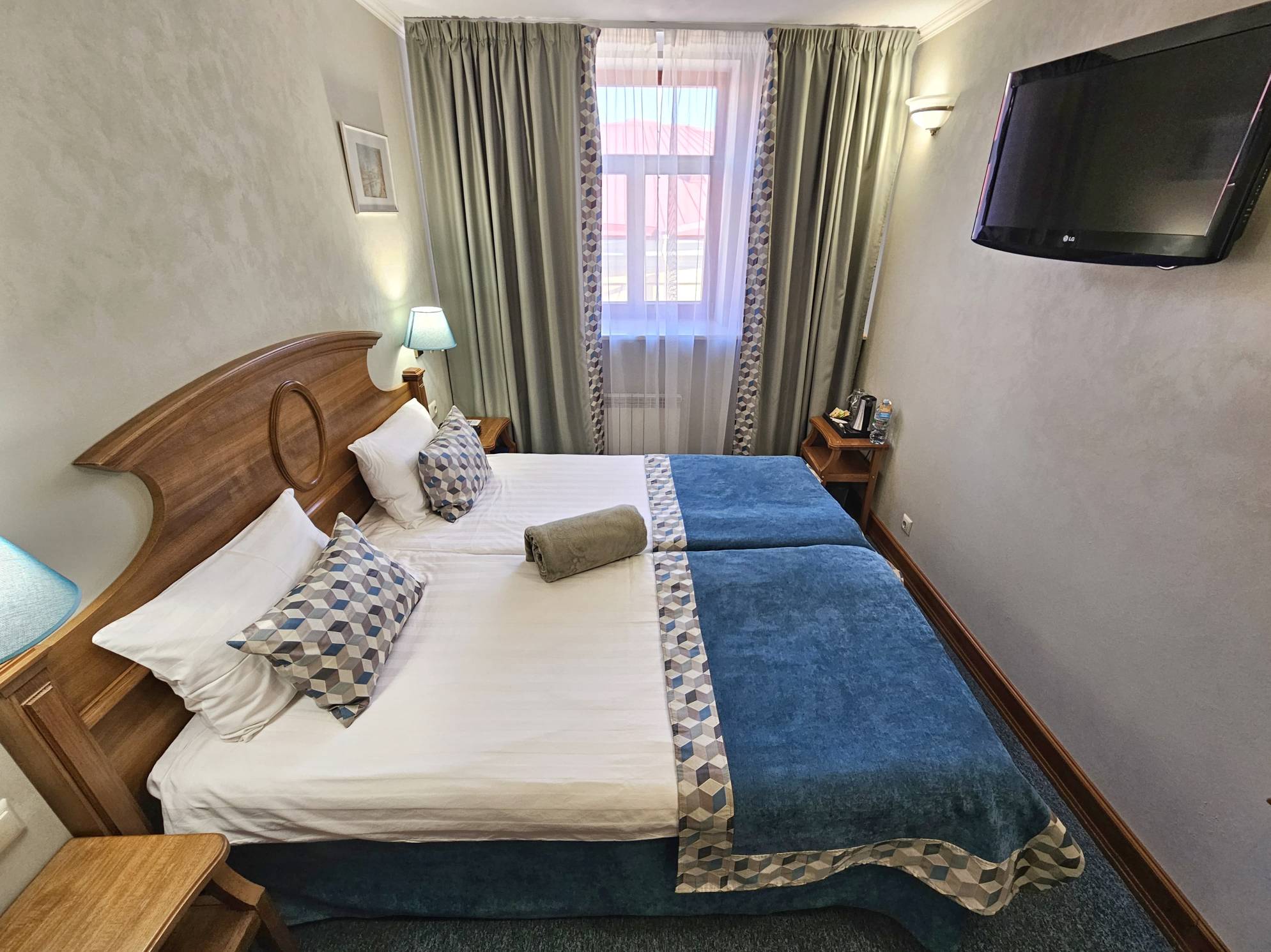 Небольшой двухместный номер с 1 кроватью или 2 отдельными кроватями