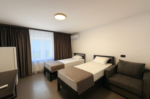 Двухместный номер с 2 двуспальными кроватями