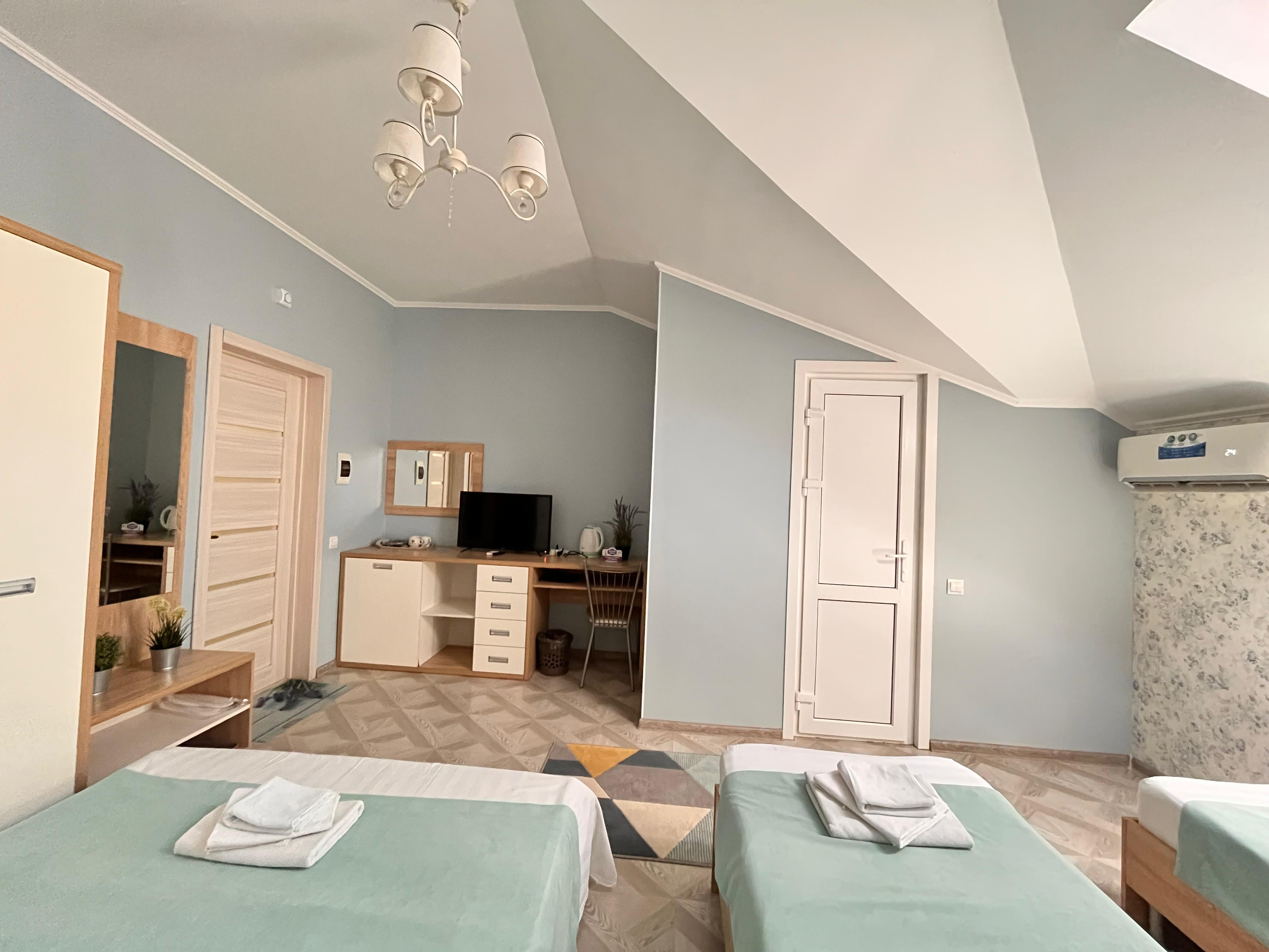 Трехместный номер Делюкс