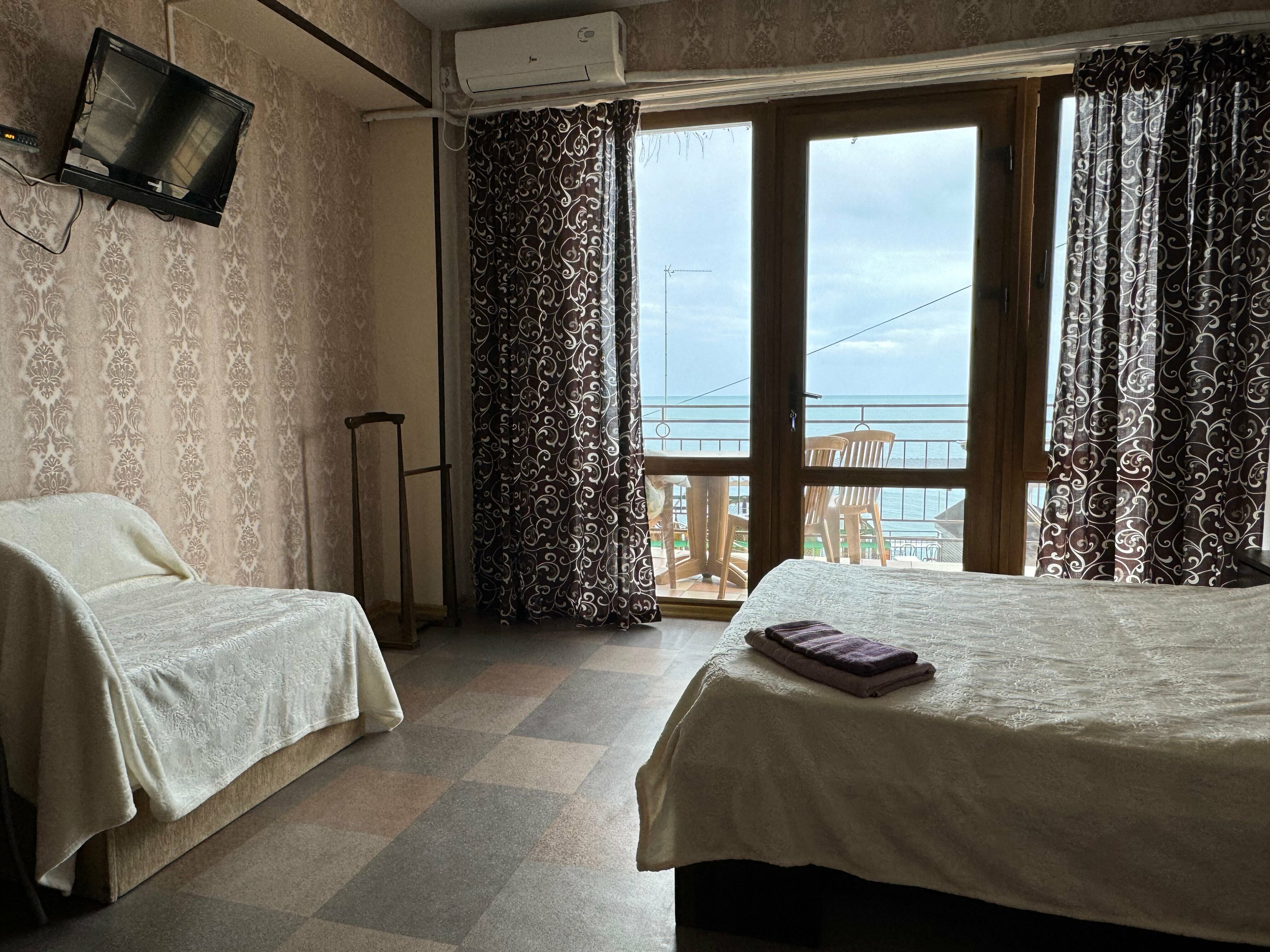 Трехместный номер Делюкс с видом на море