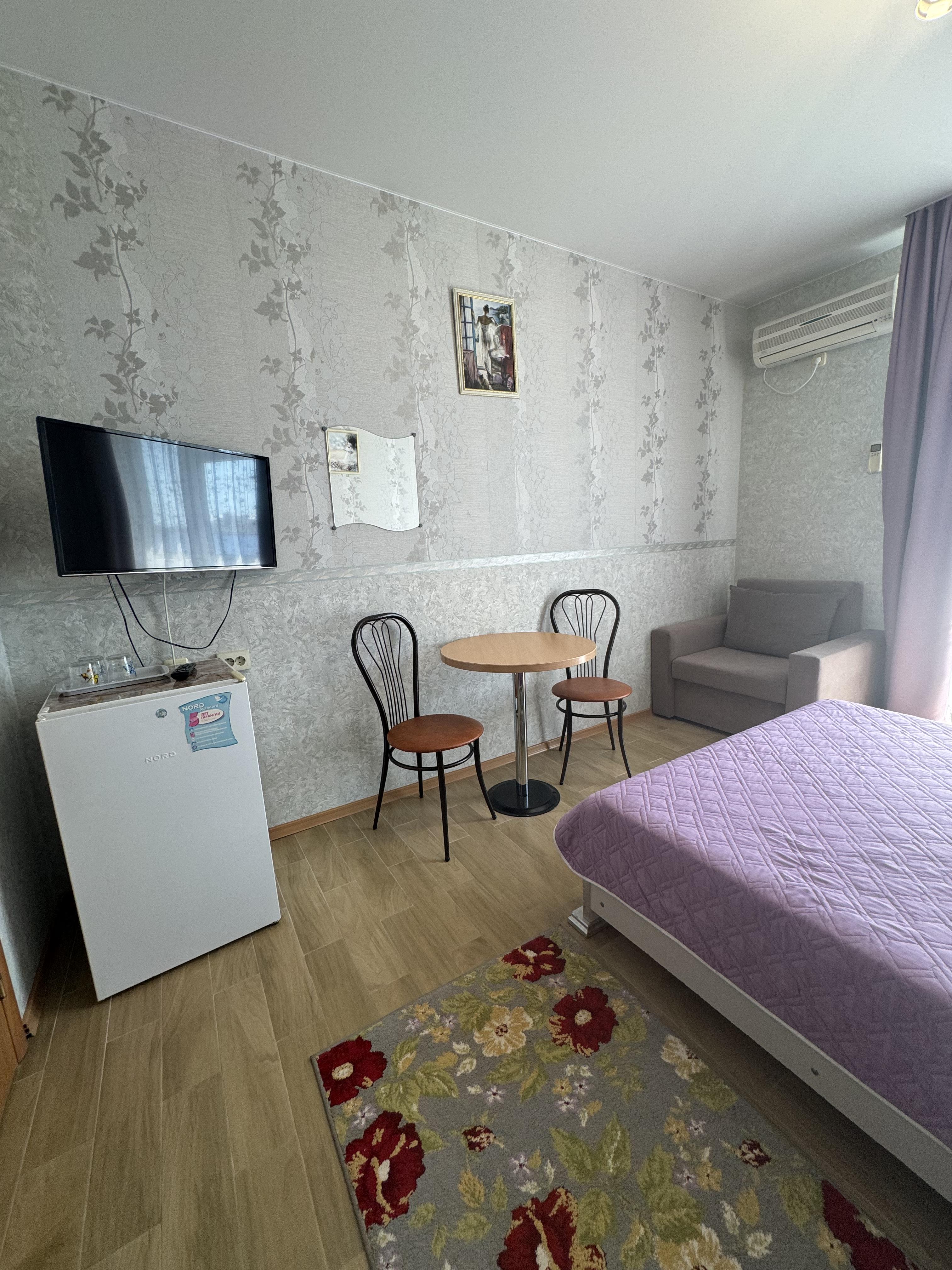 Трехместный номер с балконом