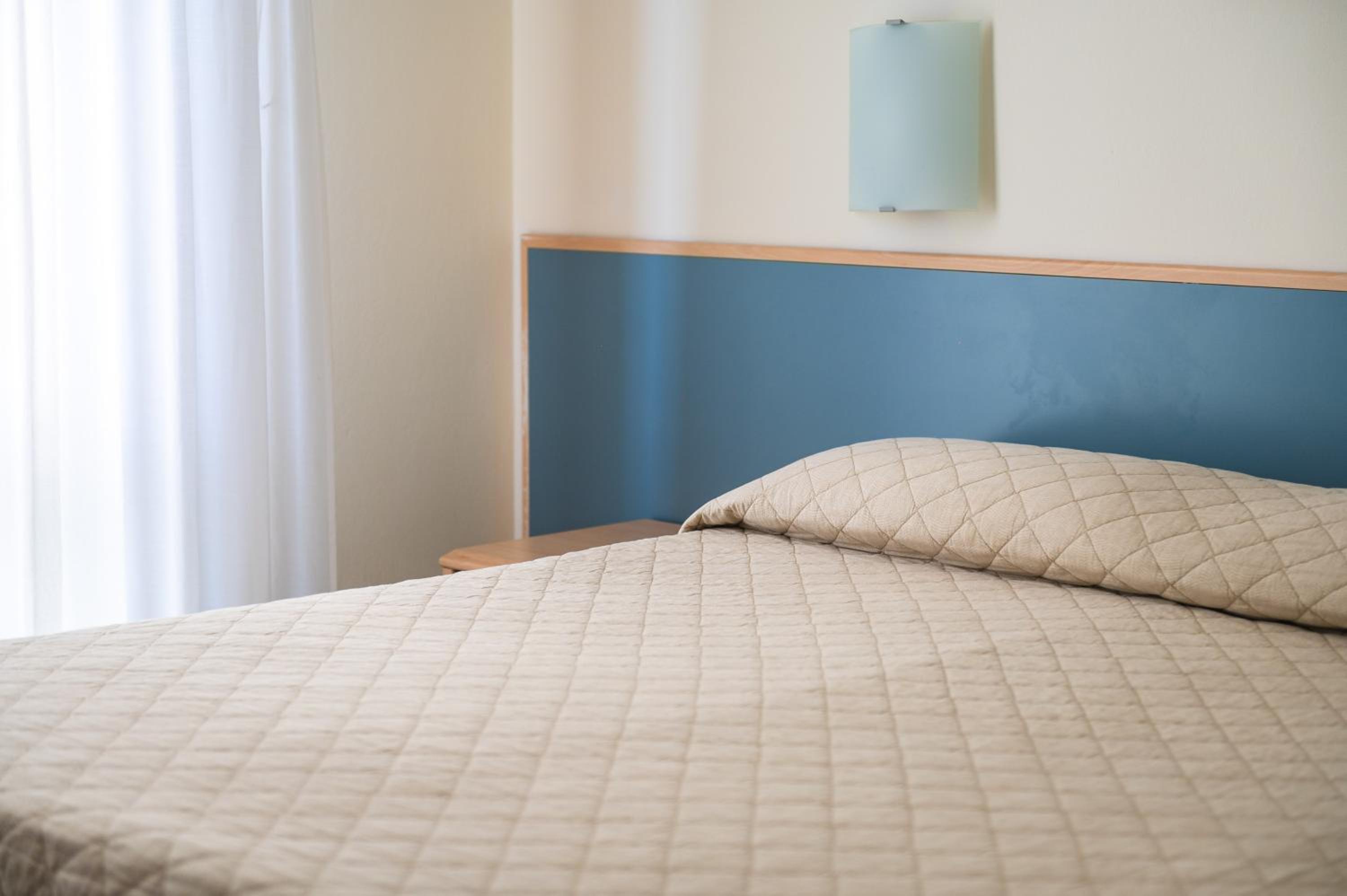 Standard Quadruple Room with Side Sea View