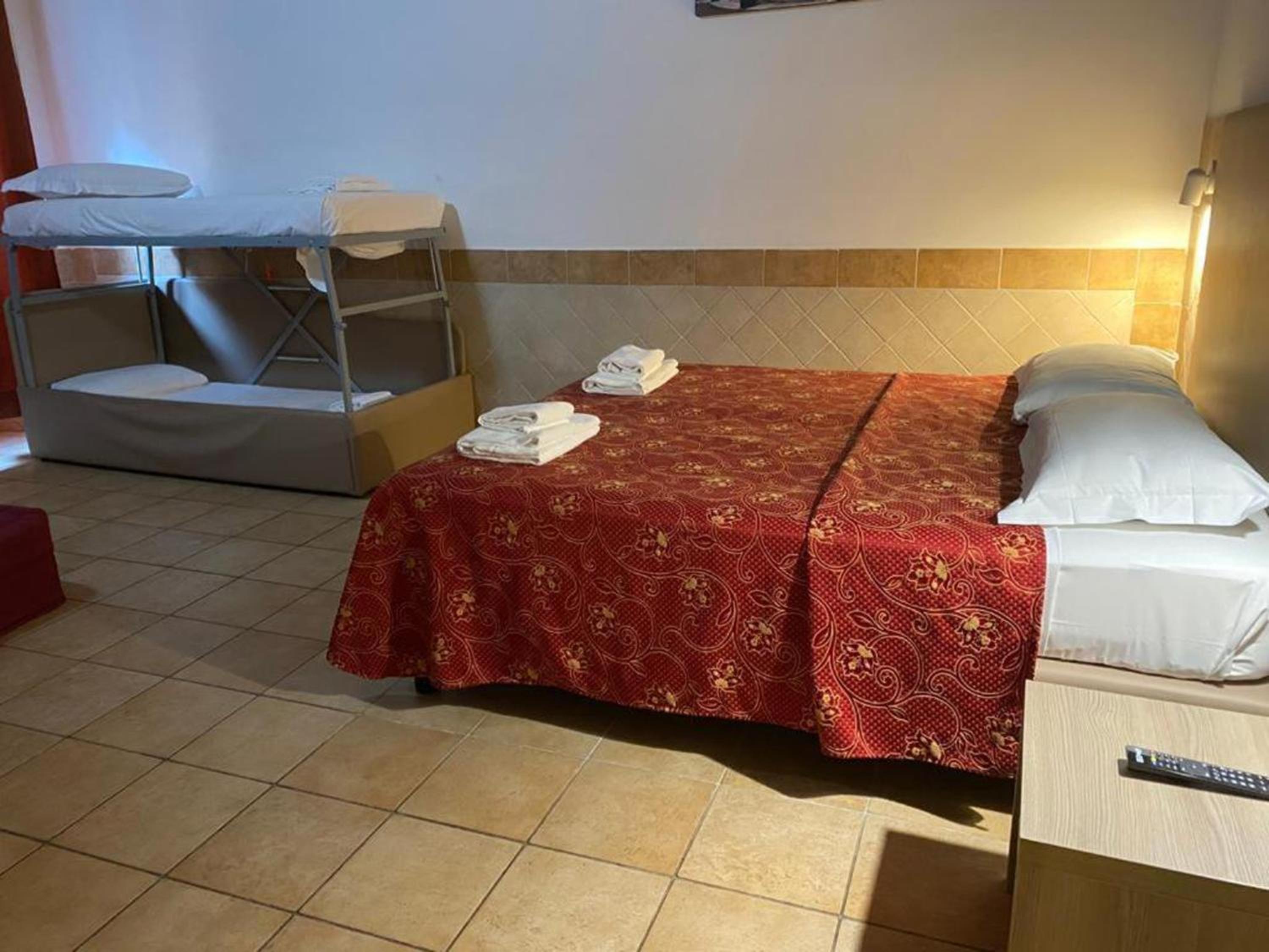 Quadruple Room with Private Bathroom