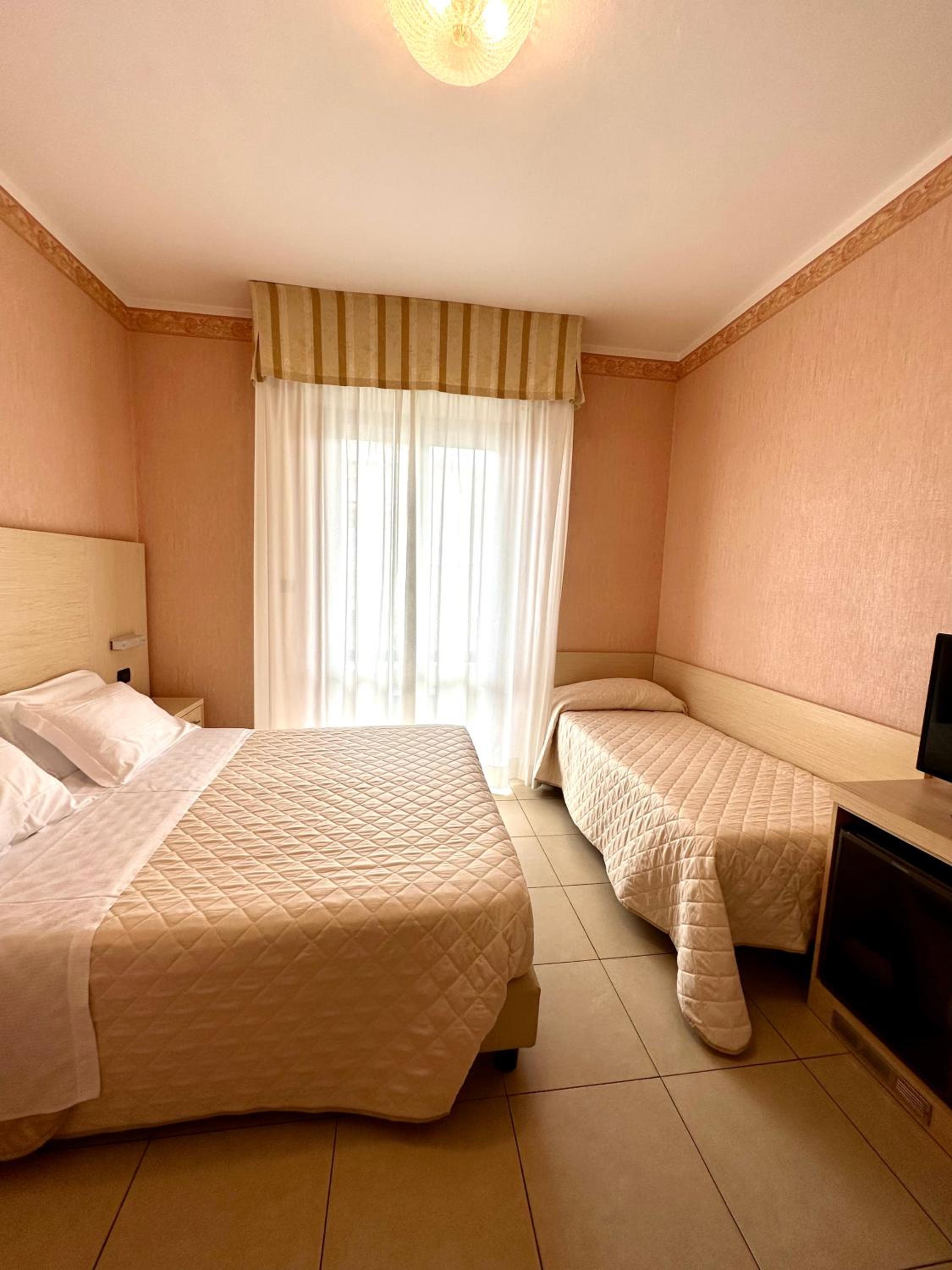 Standard Triple Room with side Sea View