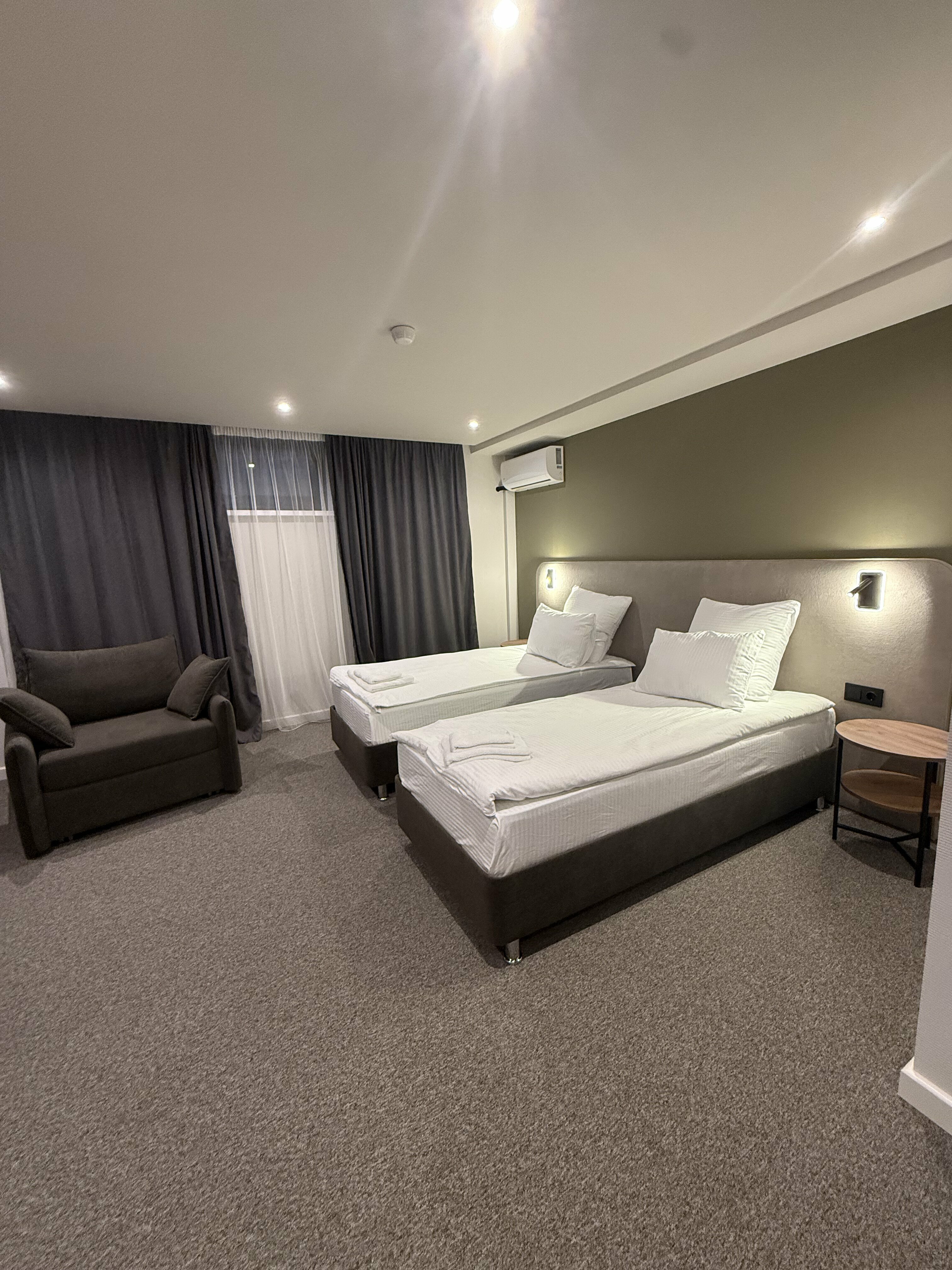 Улучшенный двухместный номер Делюкс с 1 кроватью или 2 отдельными кроватями