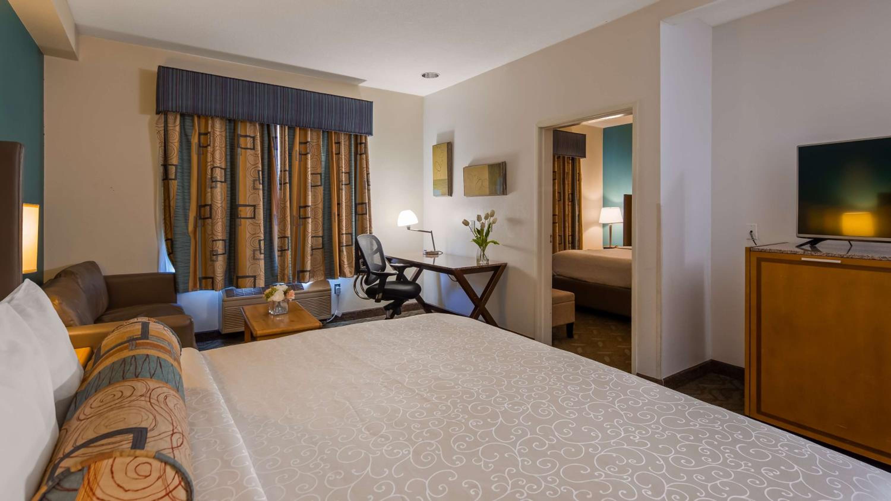 Room with One King and One Queen Bed and Sofa Bed - Non-Smoking