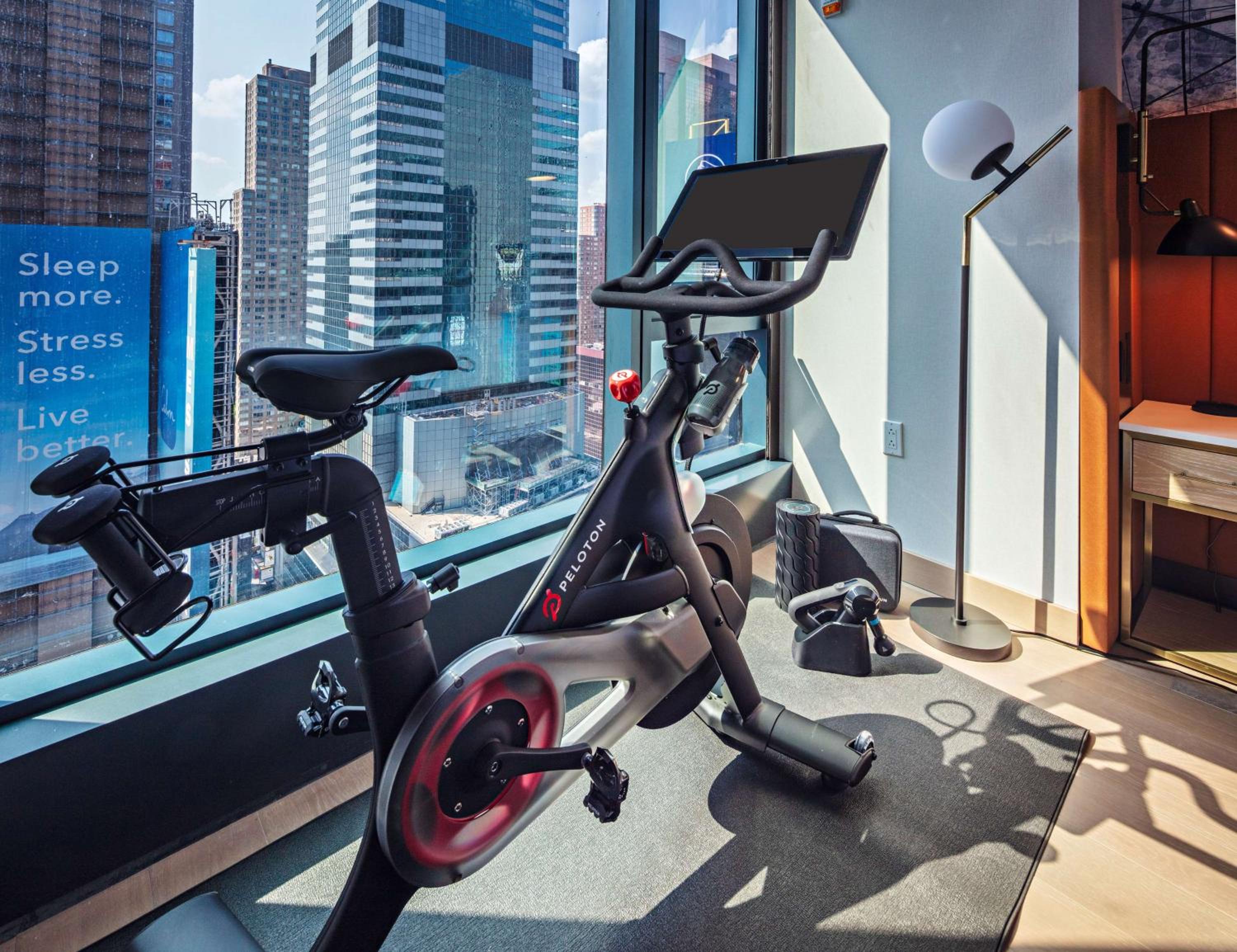 Wellness King Room with Peloton Bike and Square View