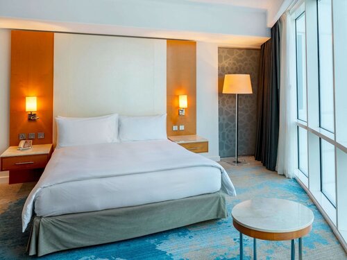 Family Room, Sea View (1 King bed / 2 Twin beds) в Hilton Doha