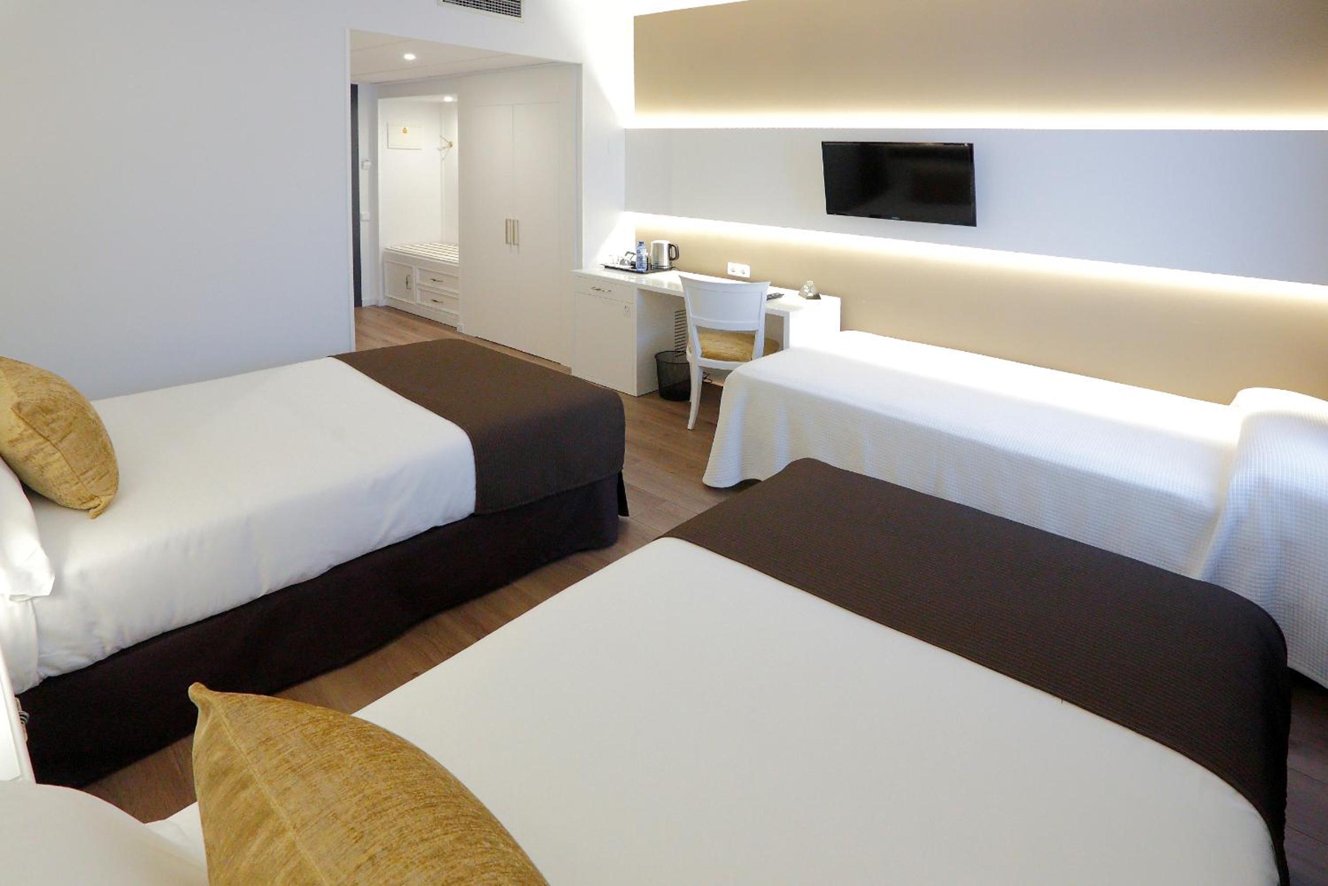 Triple Room (2 Adults + 1 Child)