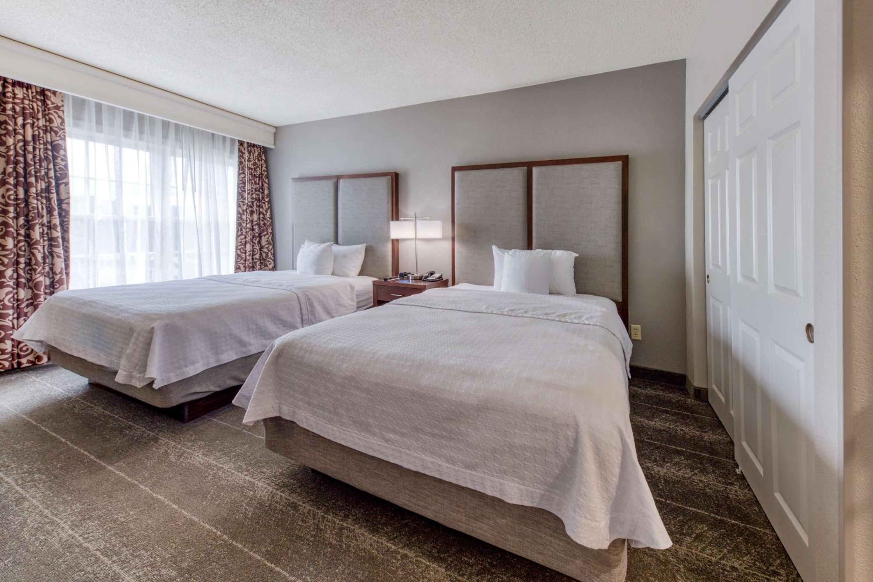 Two Bedroom Suite with One King and Two Queen Beds - Non-Smoking