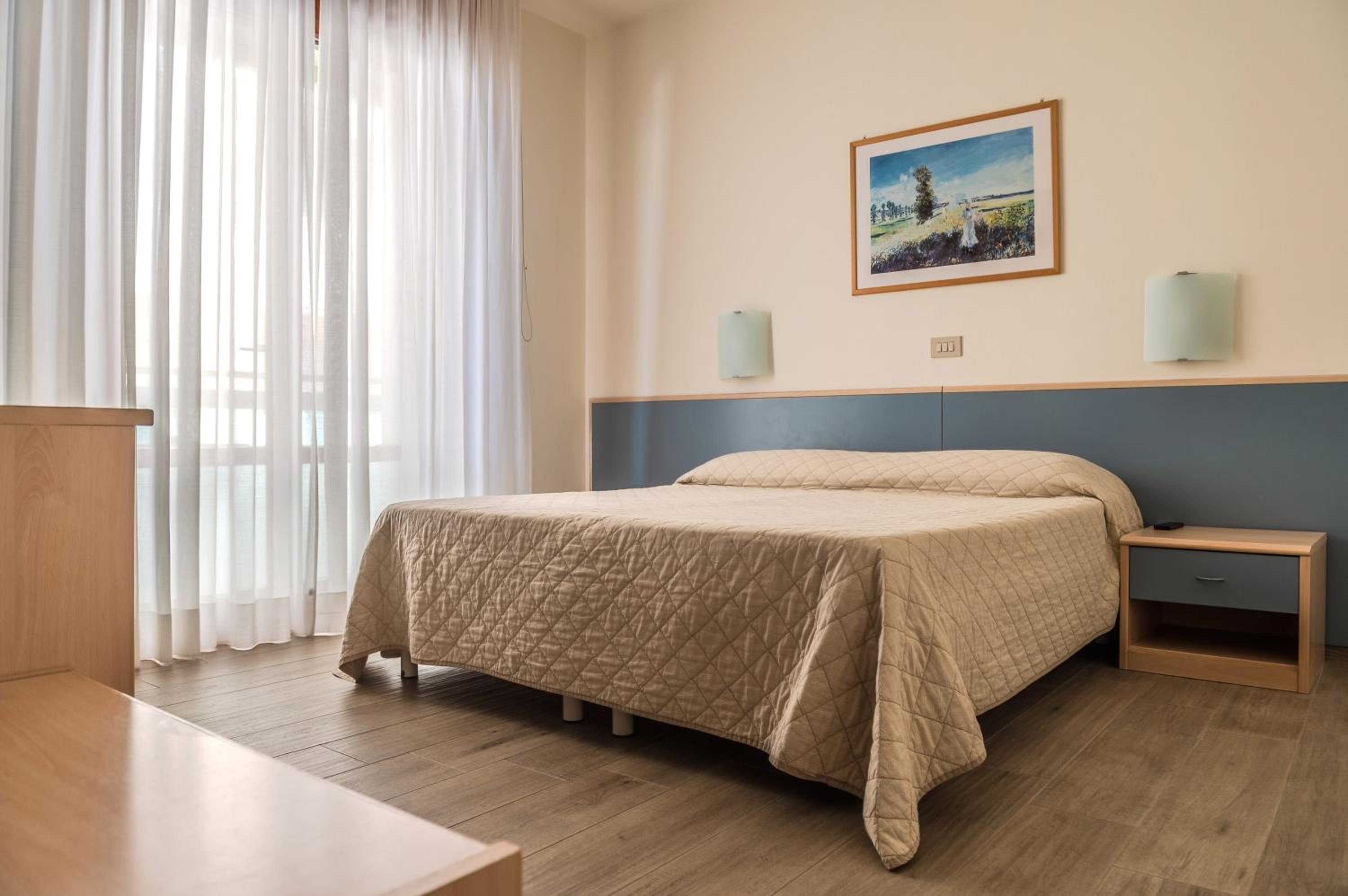 Two Connecting Rooms with Side Sea View