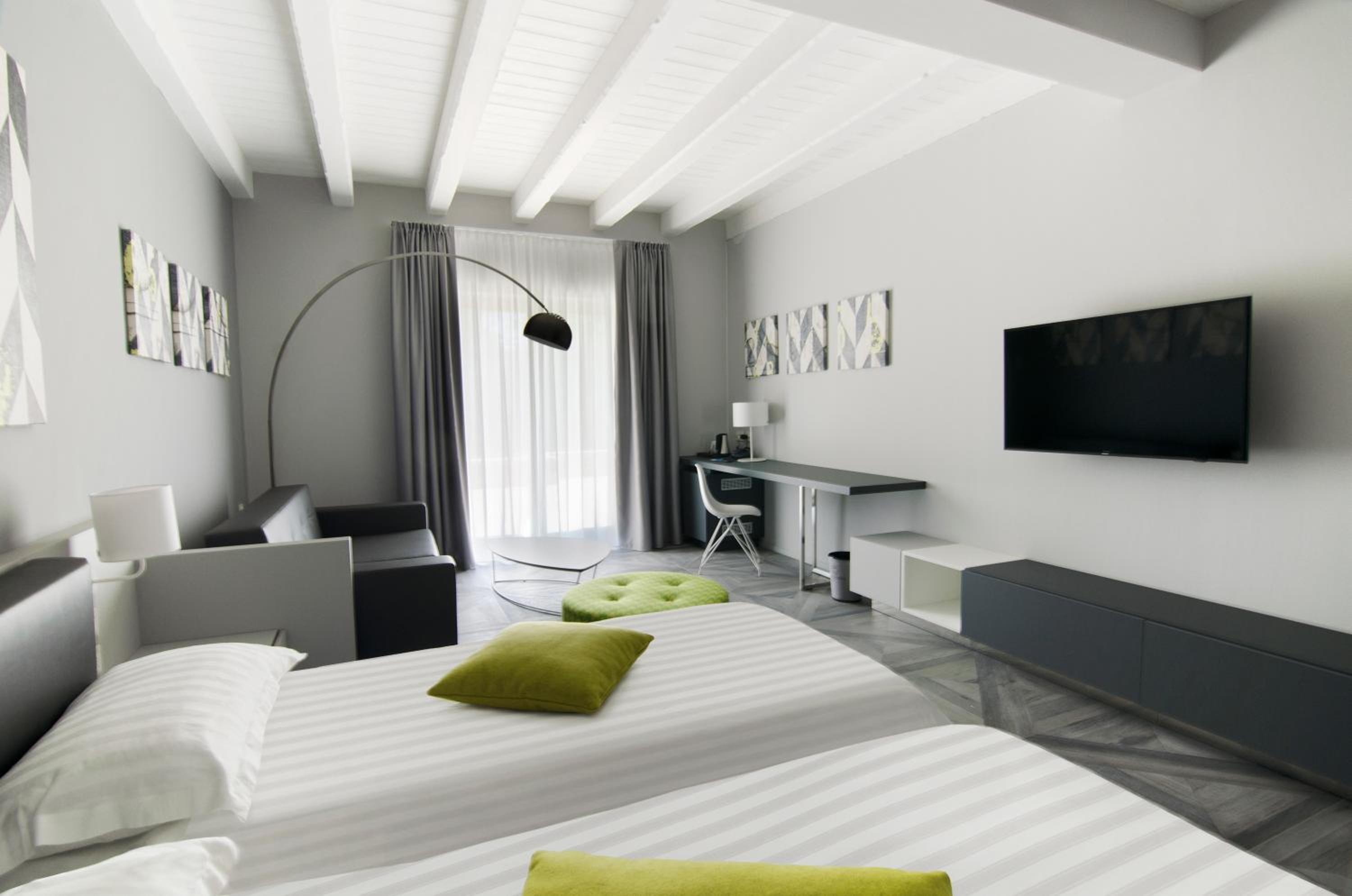 Junior Suite with Balcony and Garden View