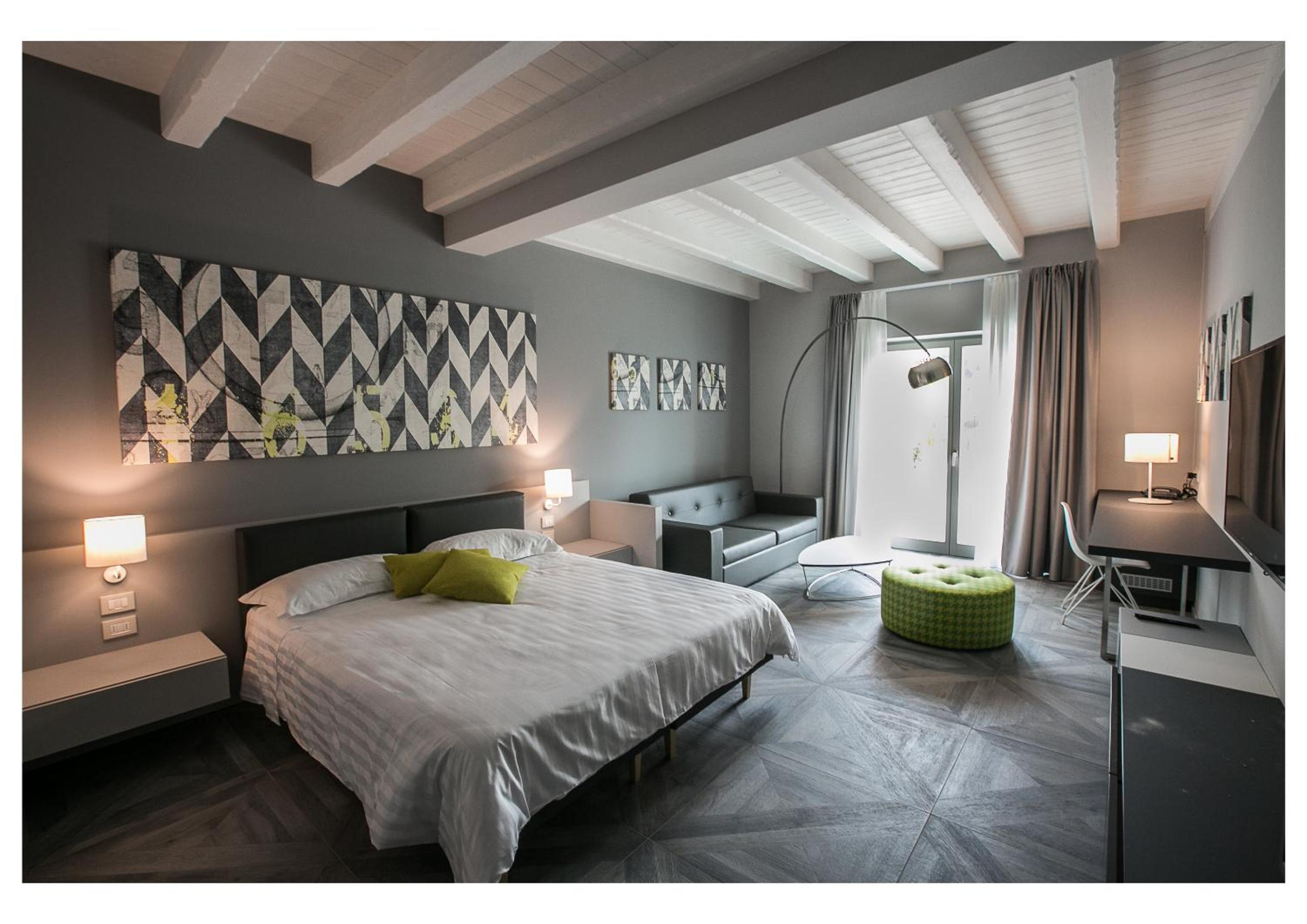 Junior Suite with Balcony and Garden View