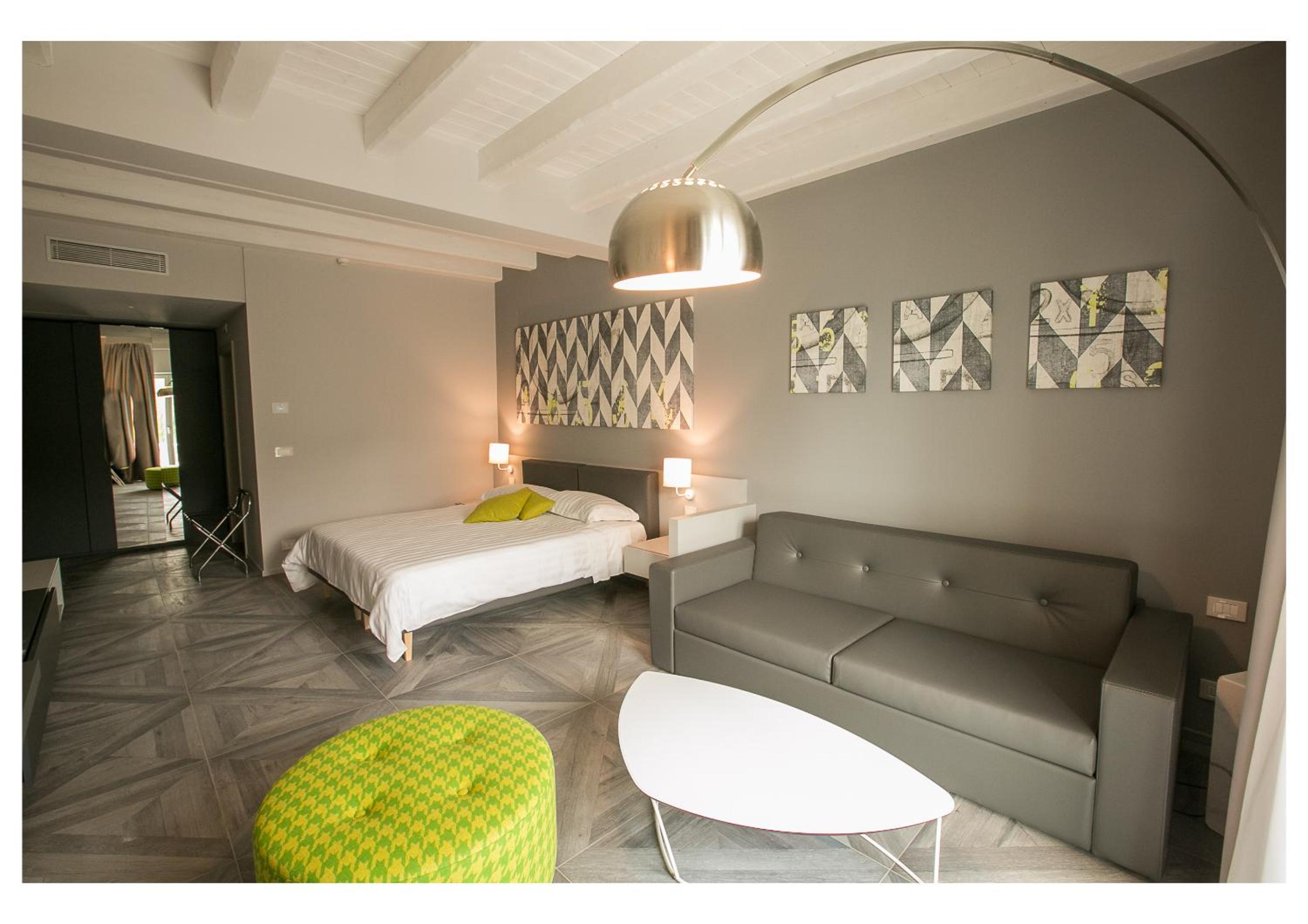 Junior Suite with Balcony and Garden View