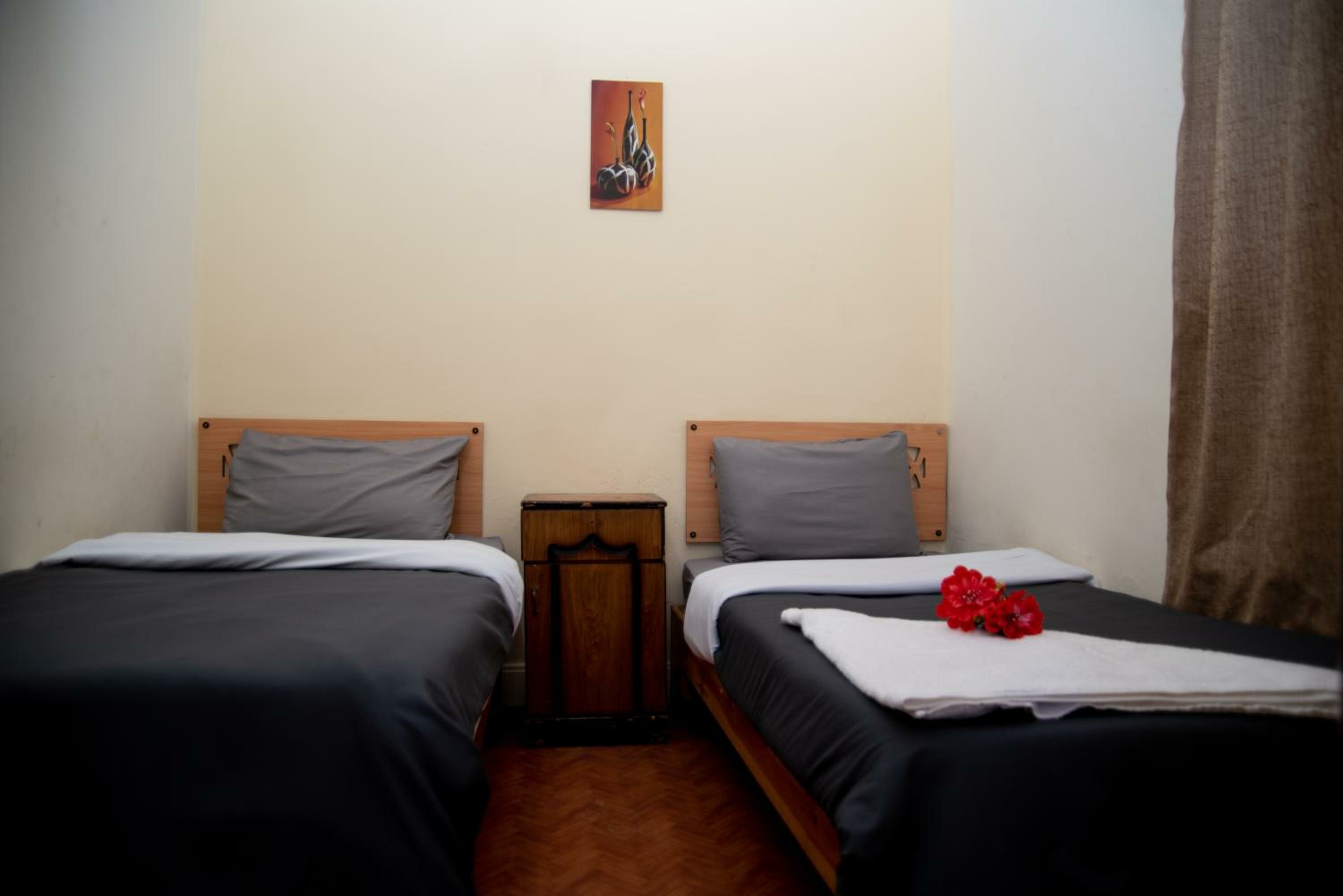 Single Room with Shared Bathroom and Fan