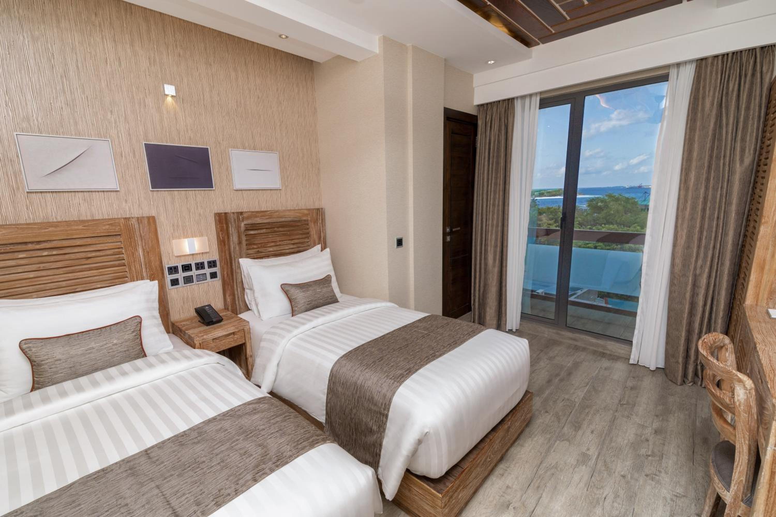 Deluxe Double or Twin with Ocean View and Balcony (Free Return Airport Transfer)