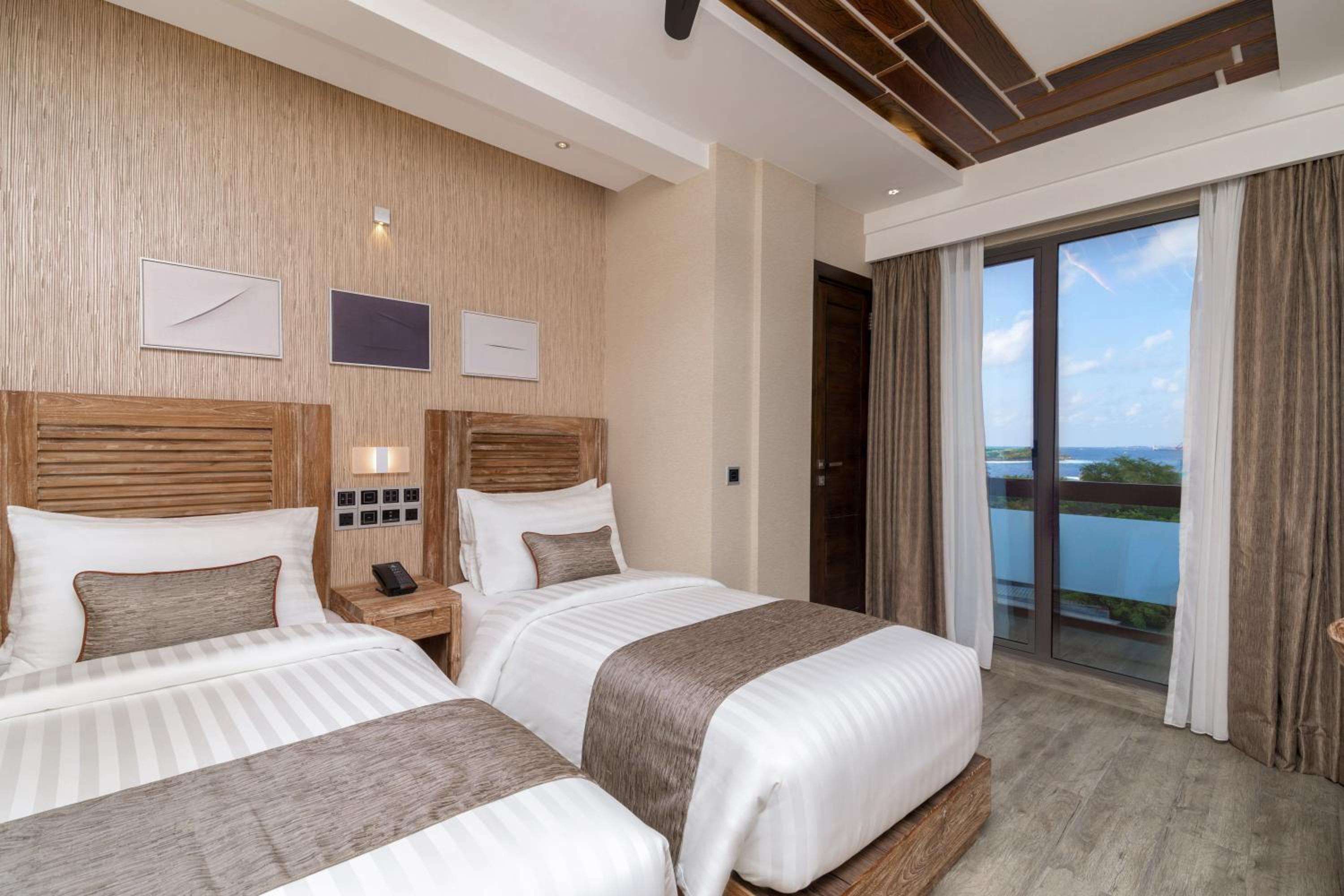 Deluxe Double or Twin with Ocean View and Balcony (Free Return Airport Transfer)