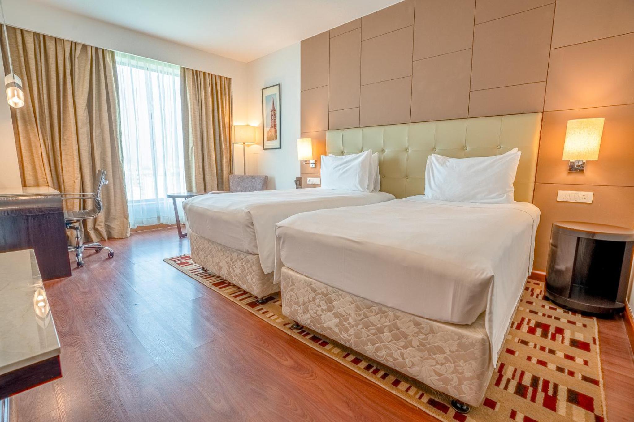 Business Class Room with Complimentary 2 pcs for Ironing per stay , 20% discount on food and soft beverage and access to business lounge