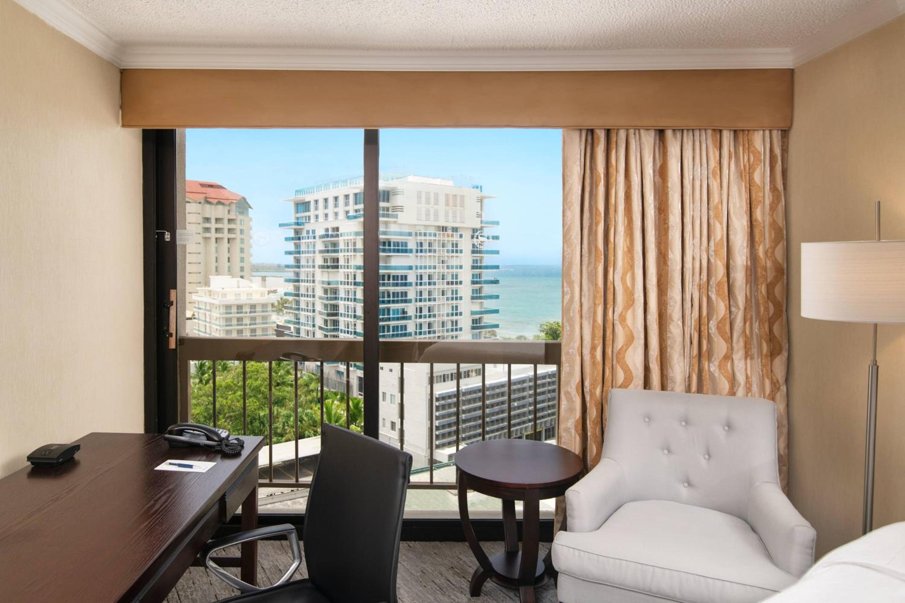 Larger Guest room, 1 King, Partial ocean view