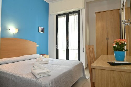 Standard Quadruple Room в Hotel Italy
