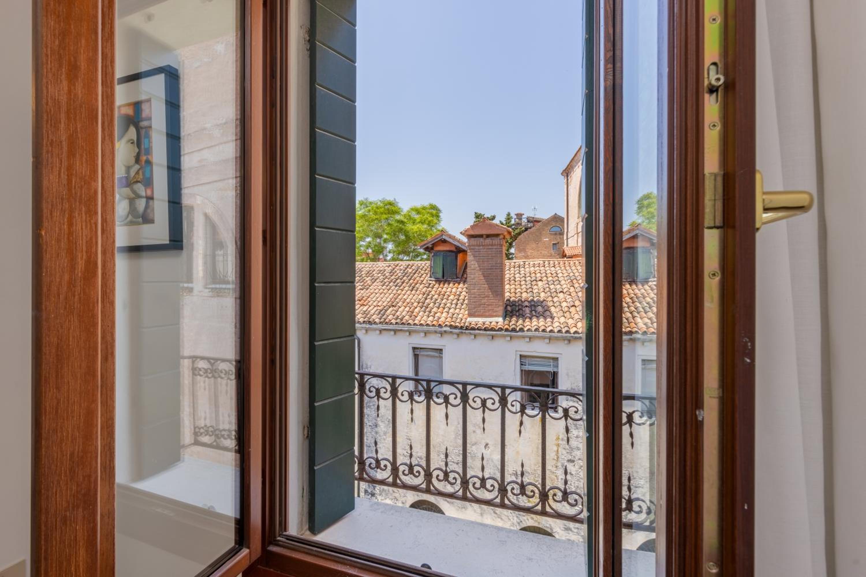Three-Bedroom Apartment with Canal View