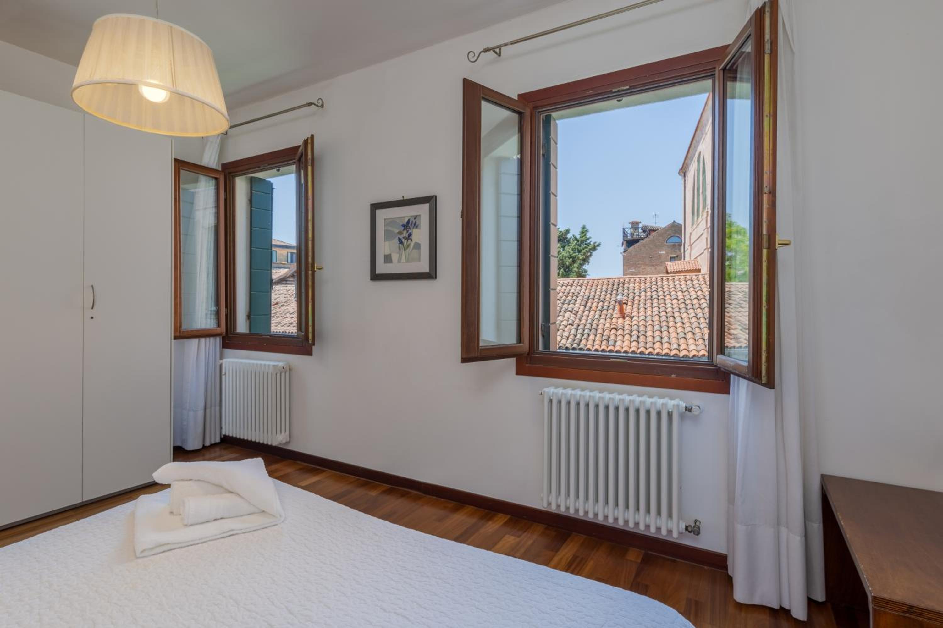 Three-Bedroom Apartment with Canal View