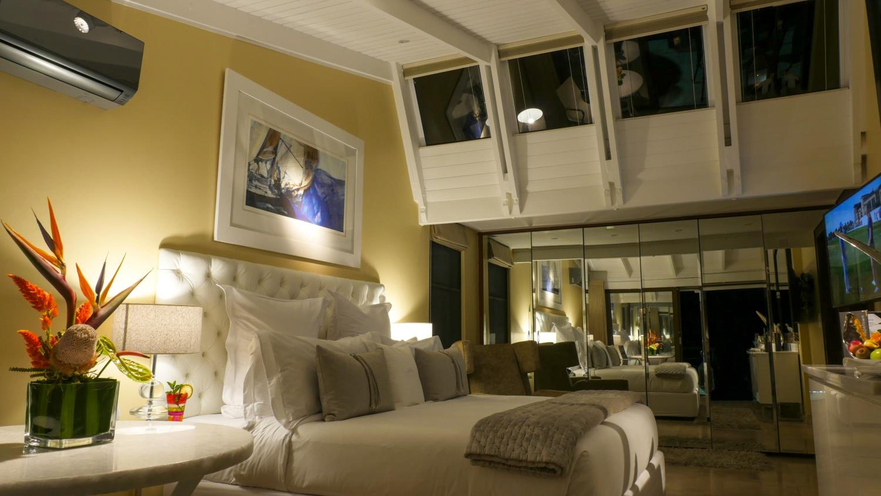 Deluxe Junior Suite with Terrace, Sea View and Mountain View (Master Bedroom)