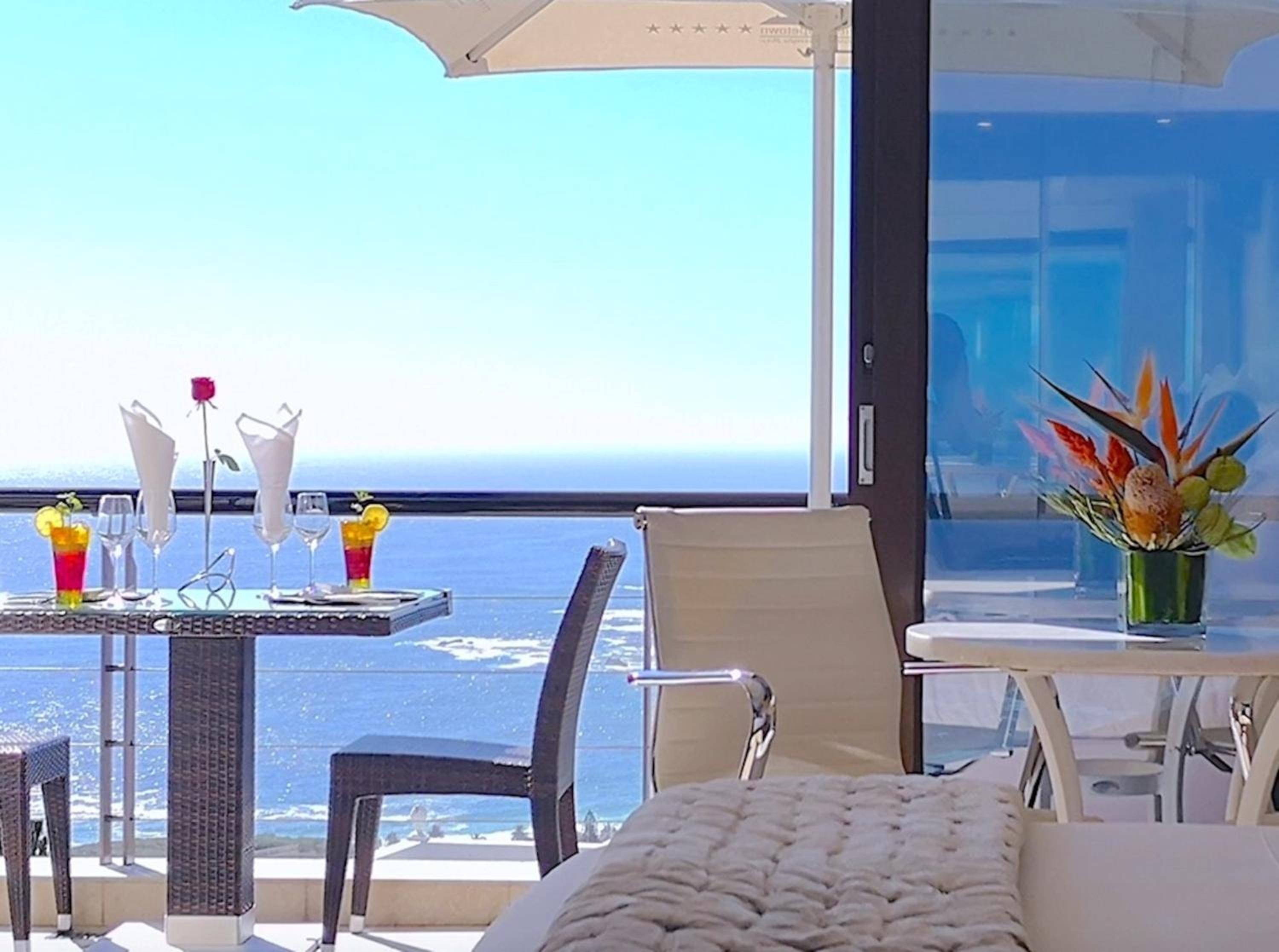 Deluxe Junior Suite with Terrace, Sea View and Mountain View (Master Bedroom)