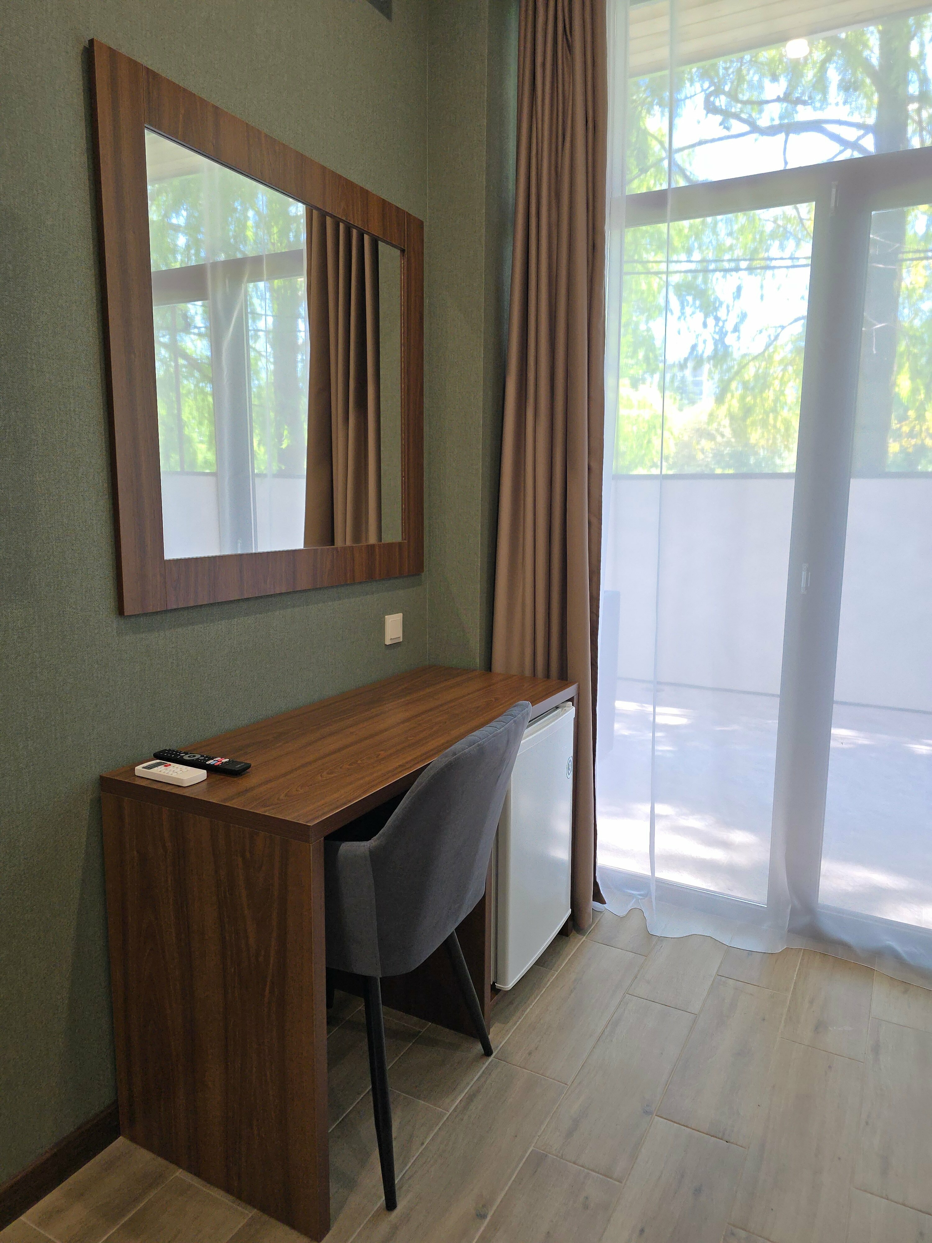 Трехместный номер с видом на сад