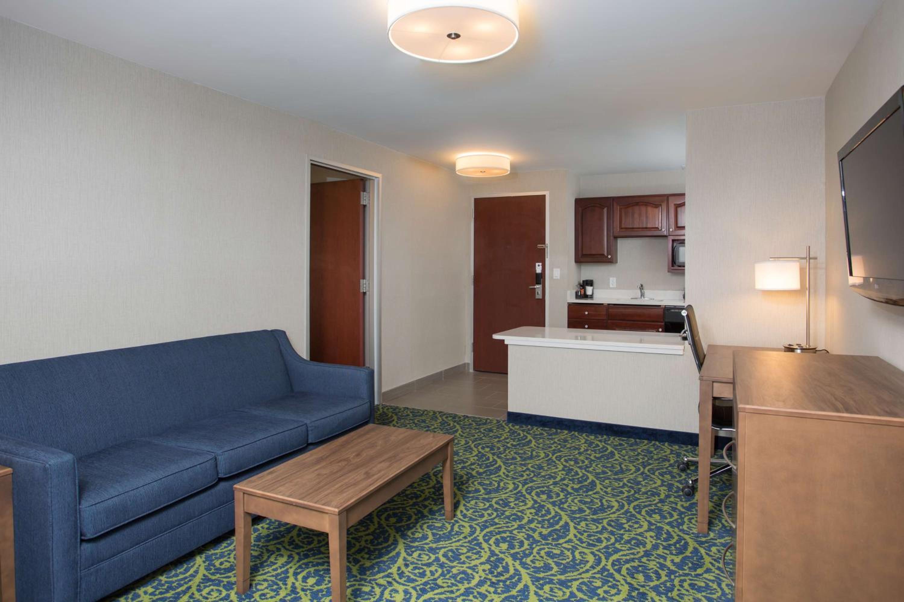Queen Suite with Two Queen Beds, Walk-In Shower, Living Room and Full Kitchen - Disability/Non-Smoking