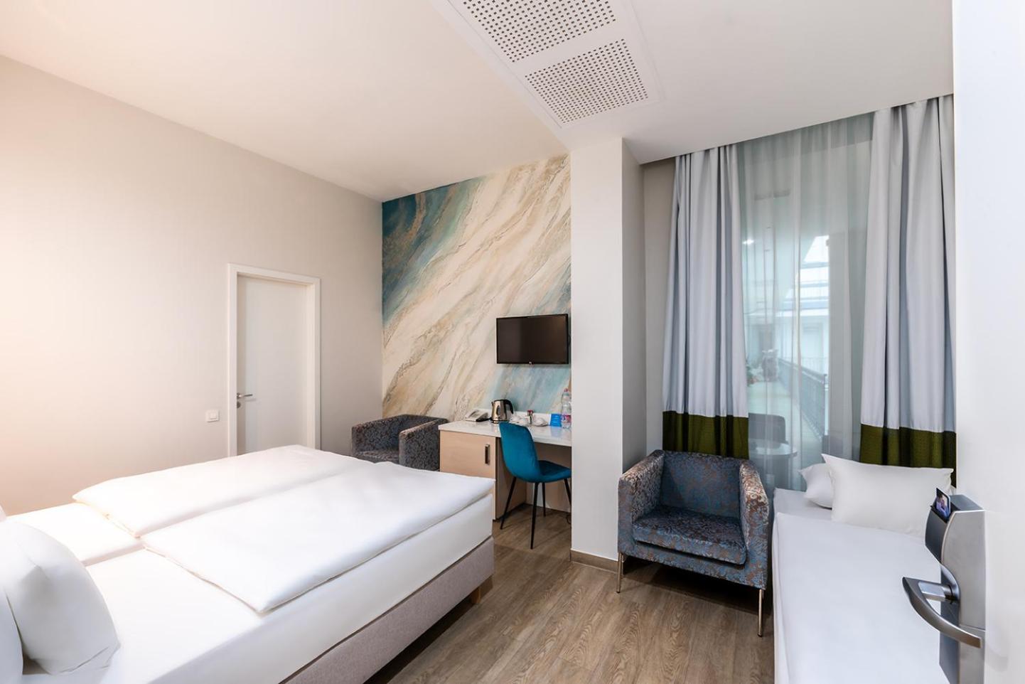 Double or Twin Room with Extra Bed