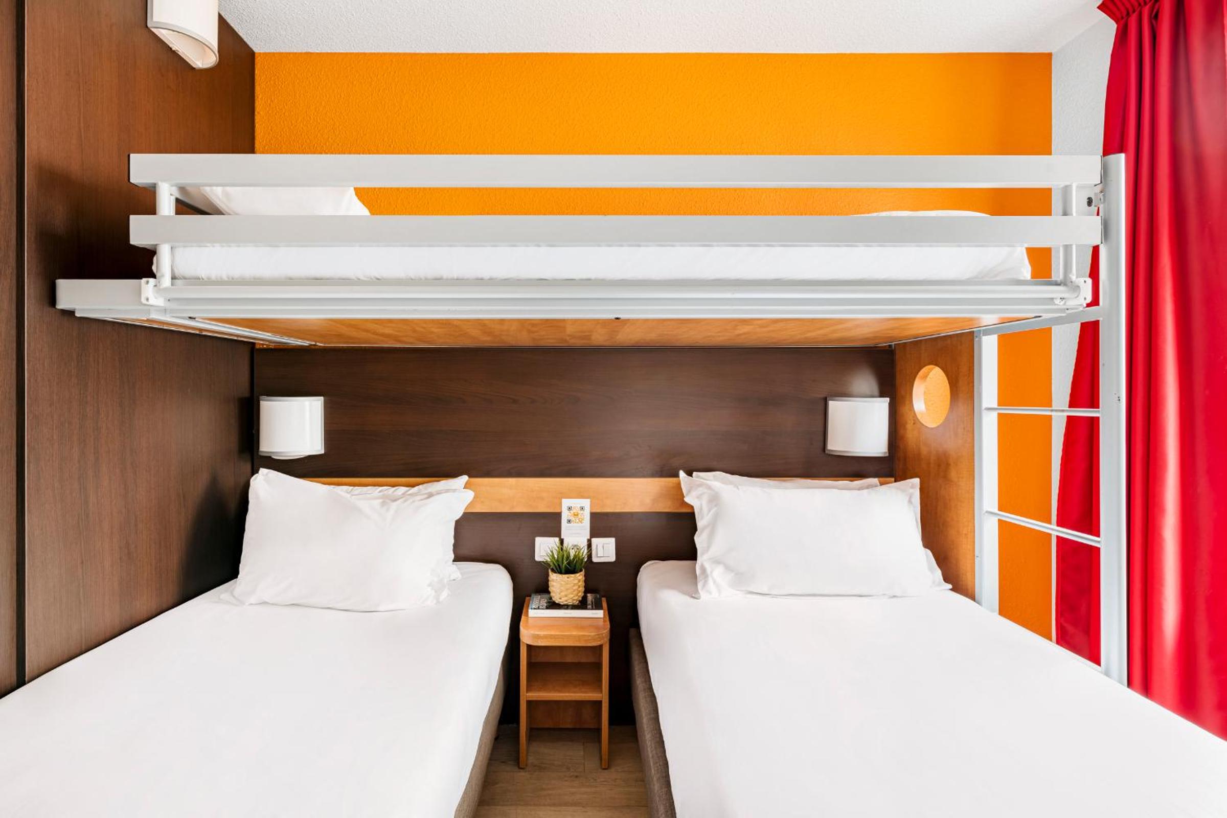 2 side-by-side Triple Rooms