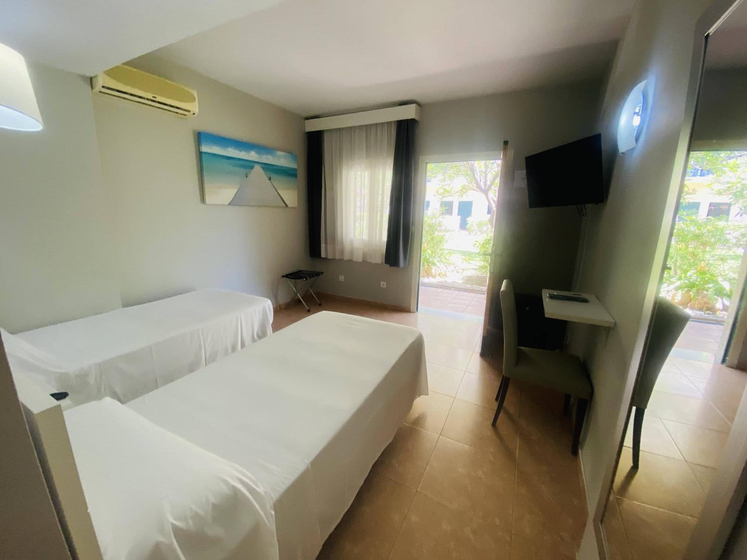 Twin Room - Ground Floor with Partial Garden View