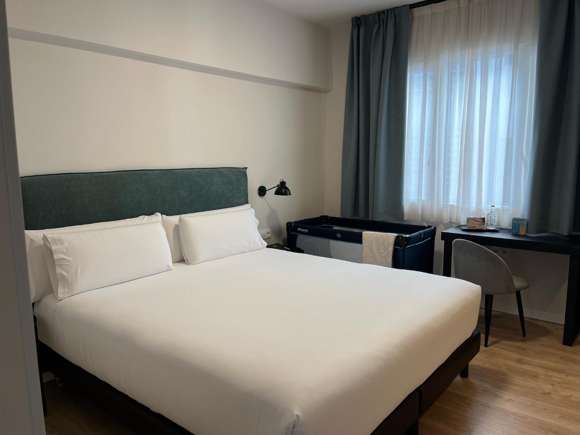 Triple Room (2 Adults + 1 Child)