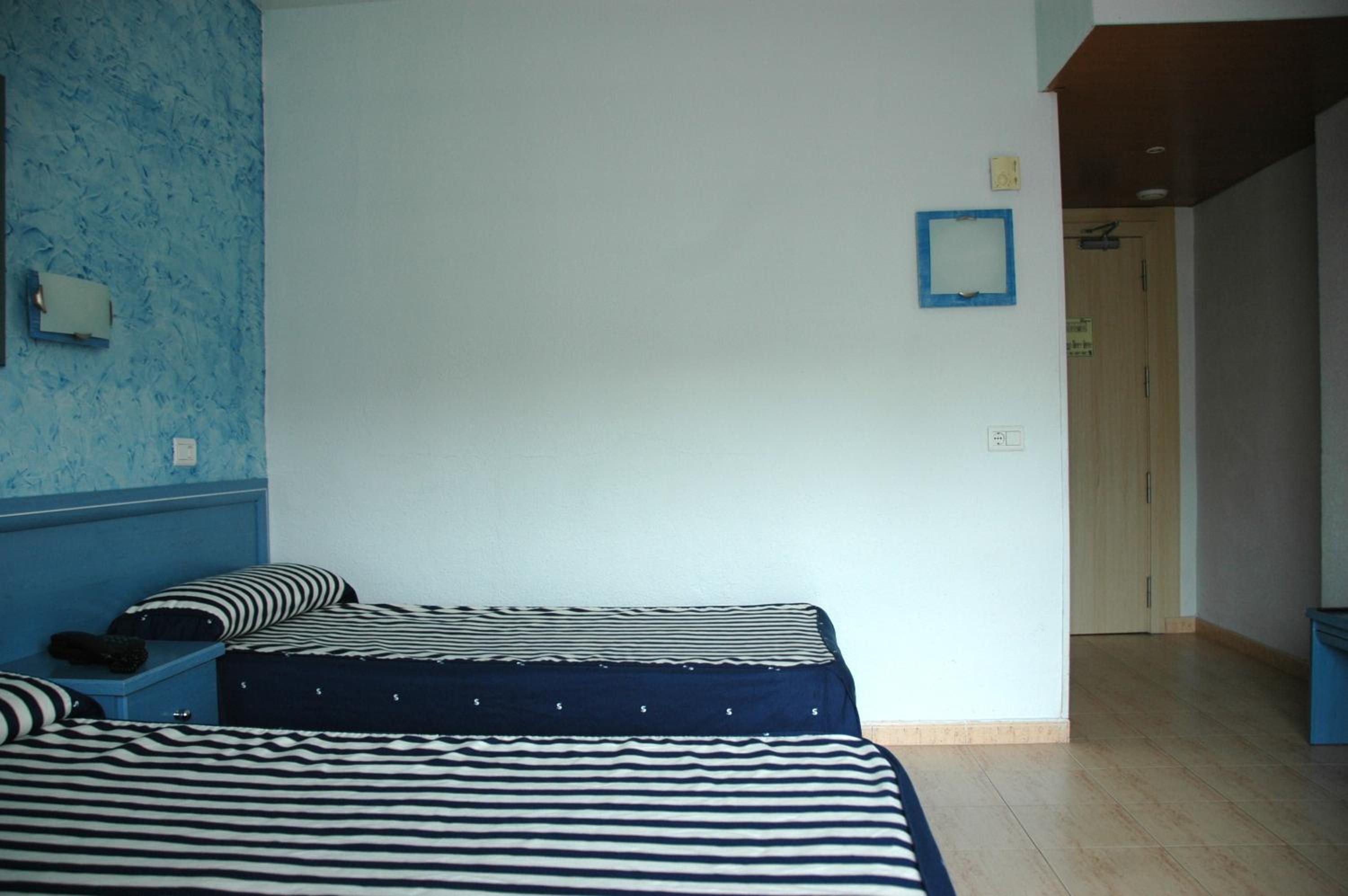 Double Room with Extra Bed (2 Adults + 1 Child)