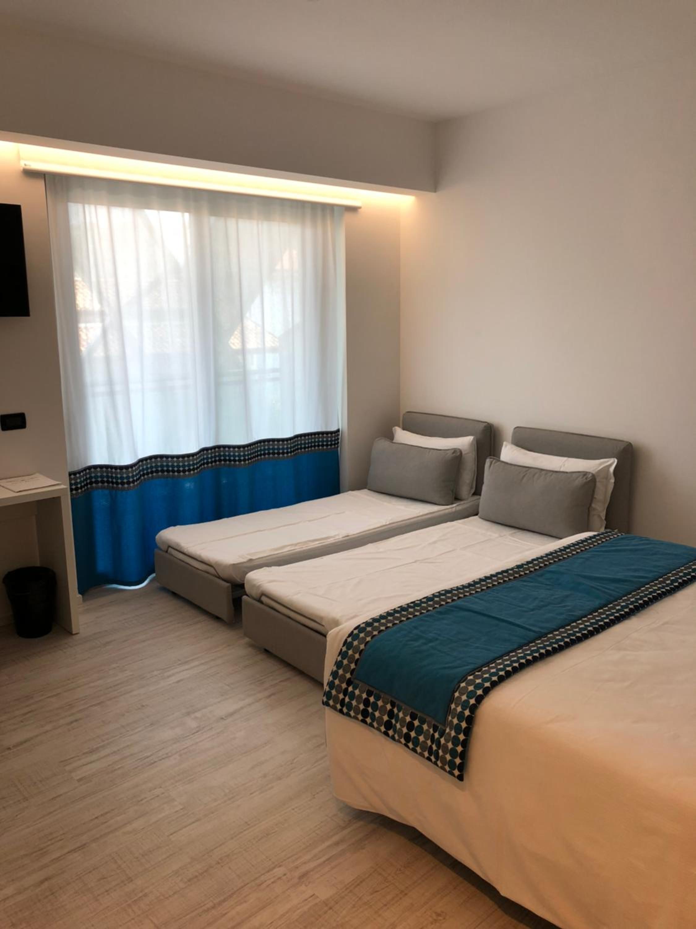 Superior Triple Room with beach access