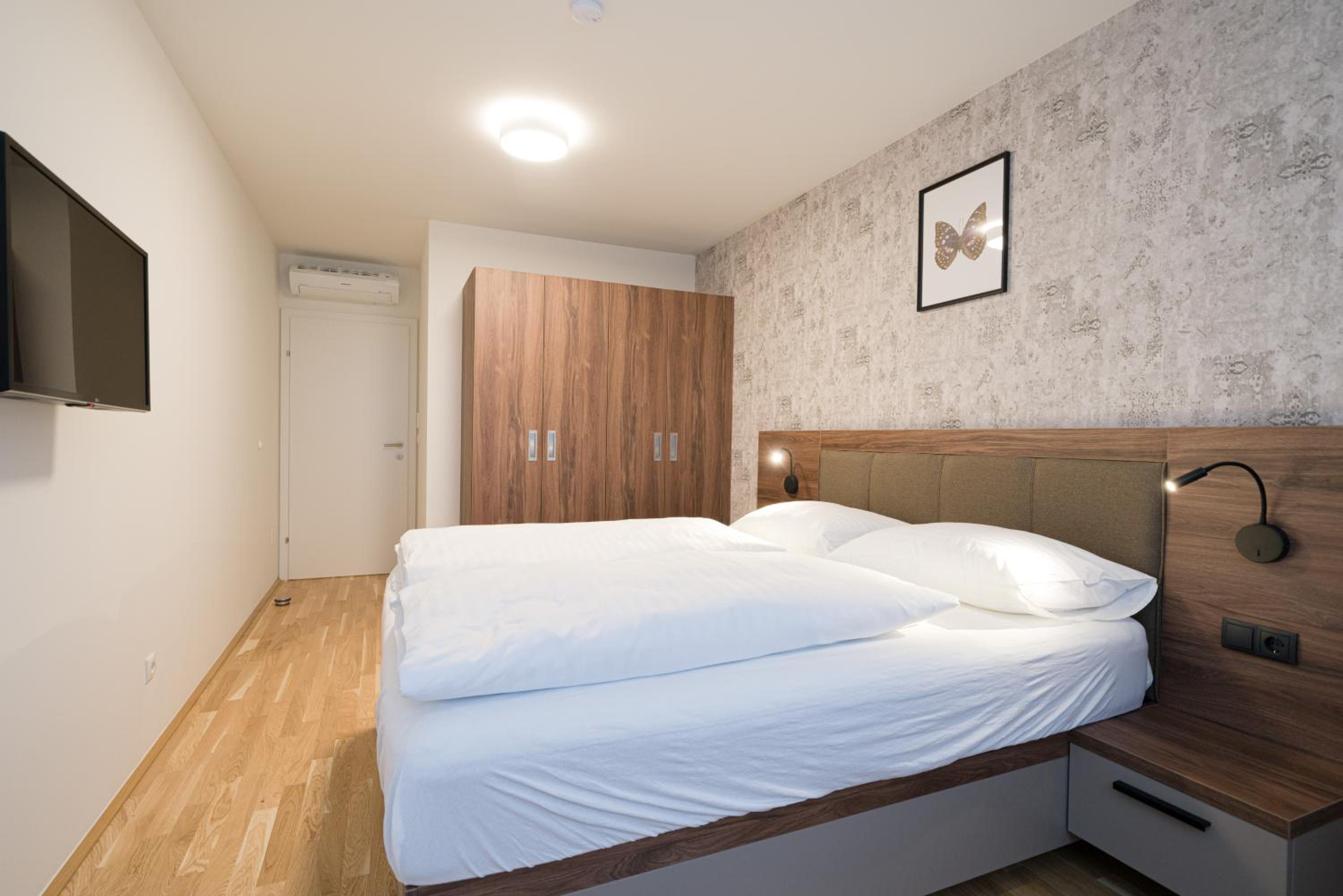 Four-Bedroom Apartment with Balcony 