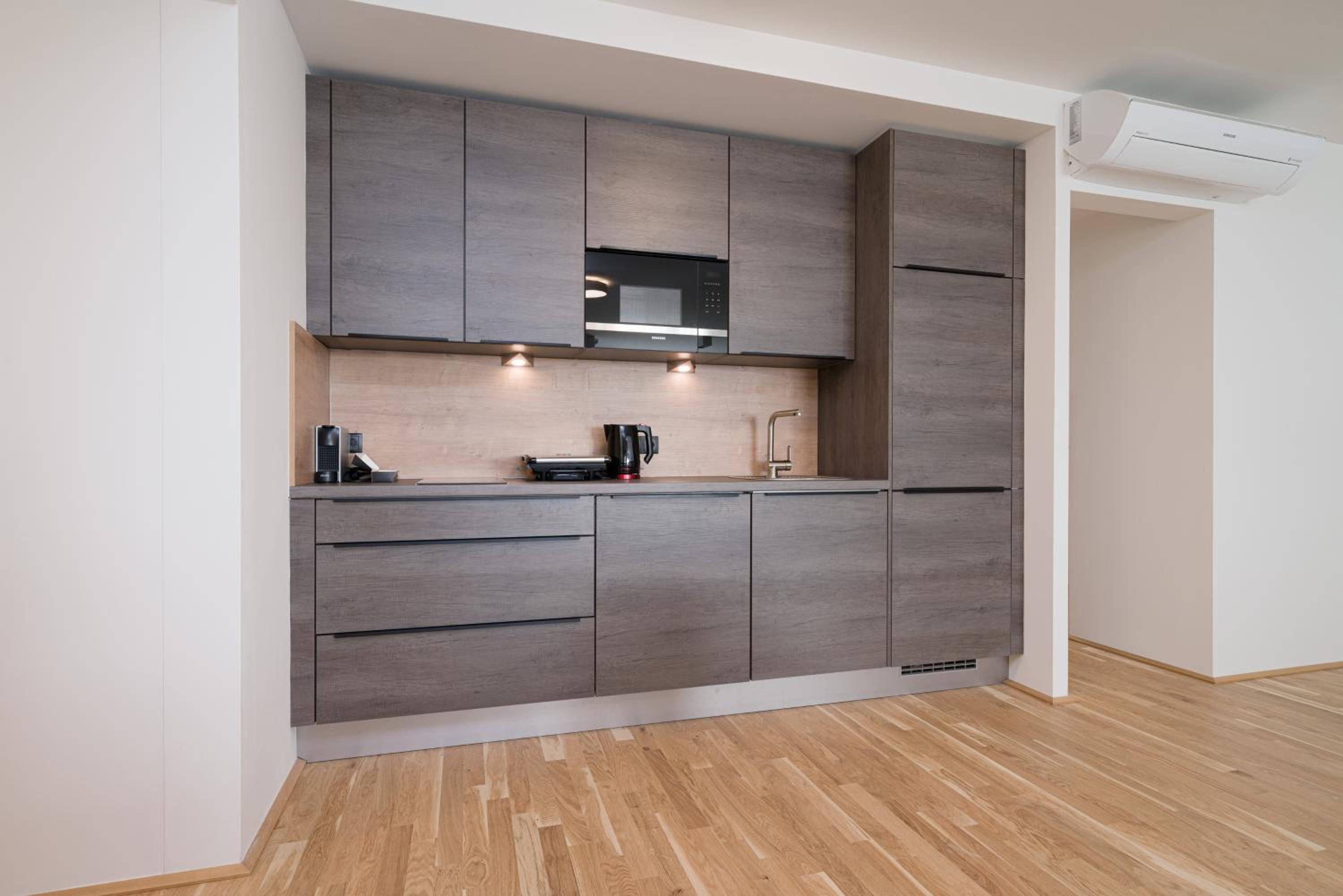 Four-Bedroom Apartment with Balcony 