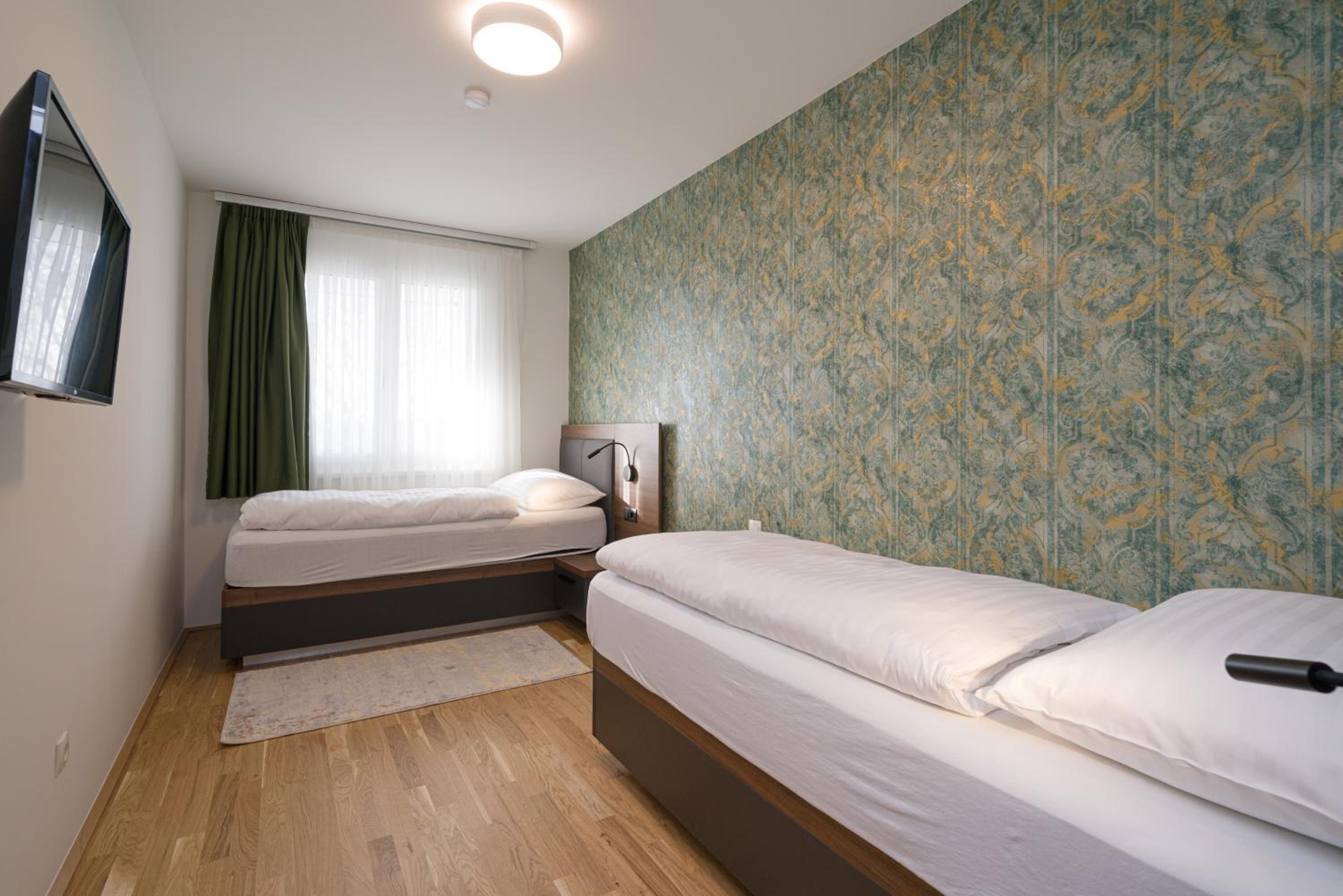 Four-Bedroom Apartment with Balcony 