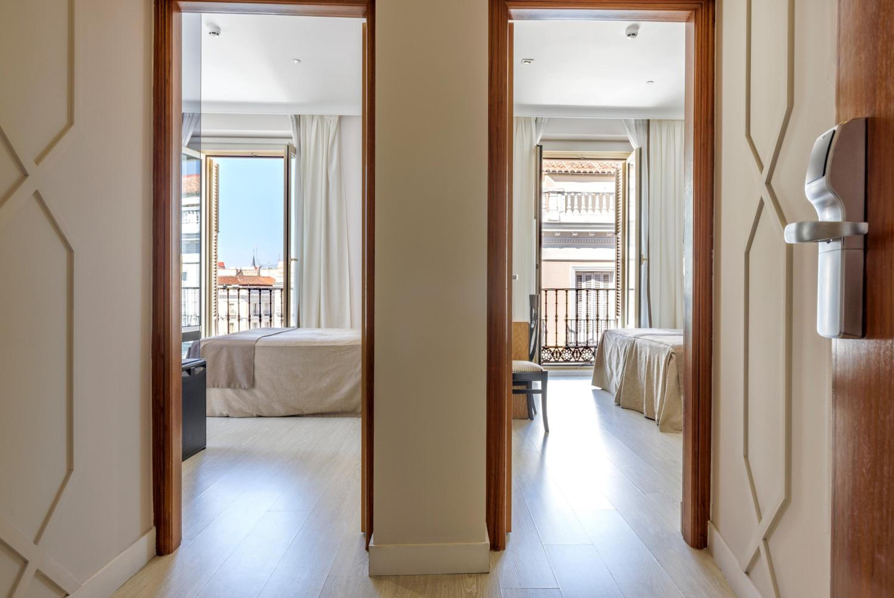 Two Connecting Double Rooms with Puerta del Sol View
