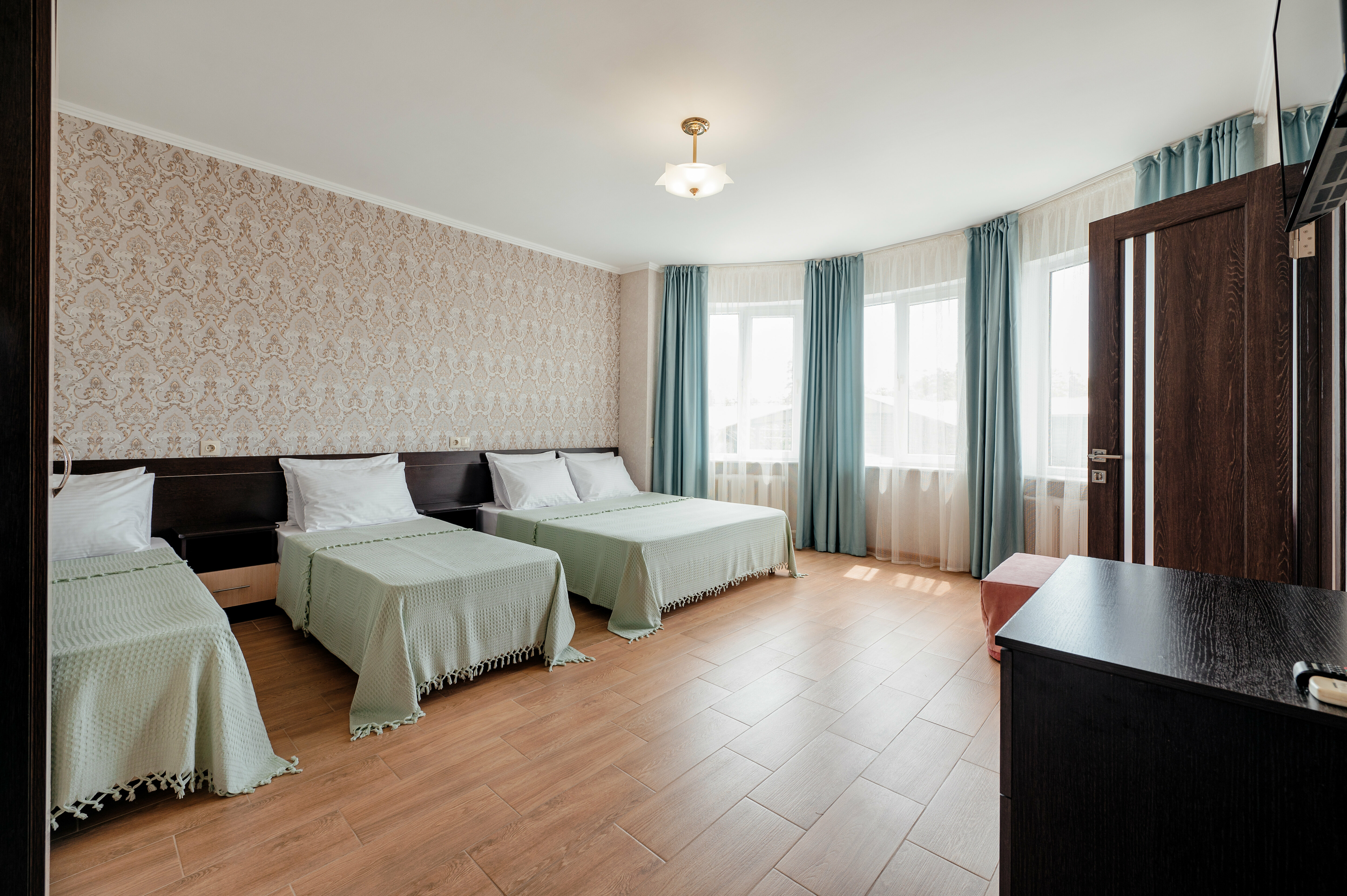 Улучшенный четырехместный номер