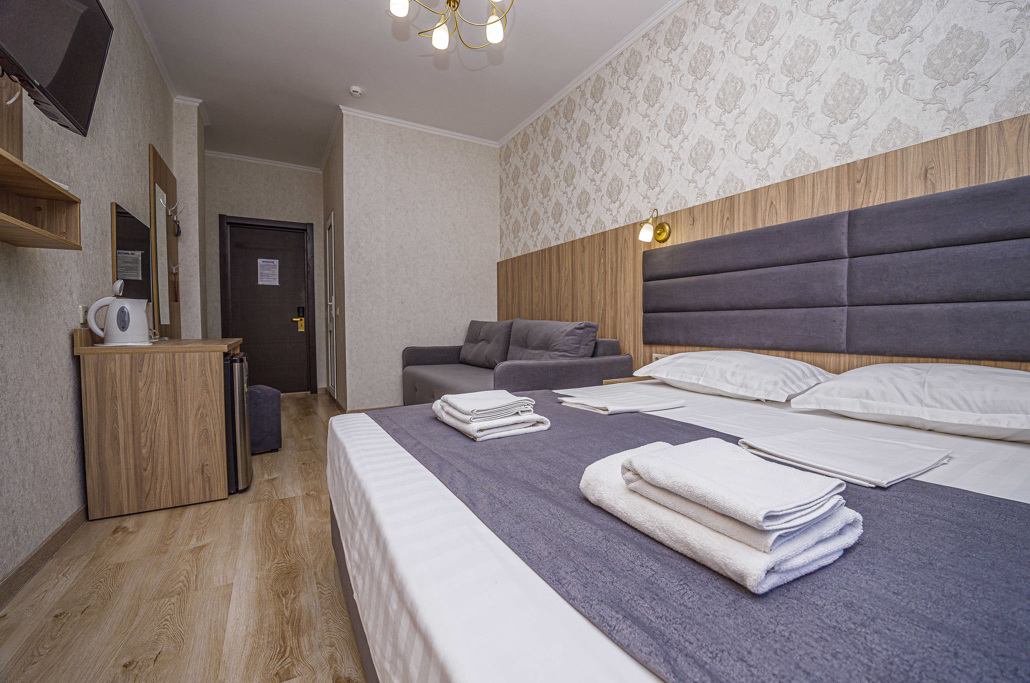 Трехместный номер с балконом