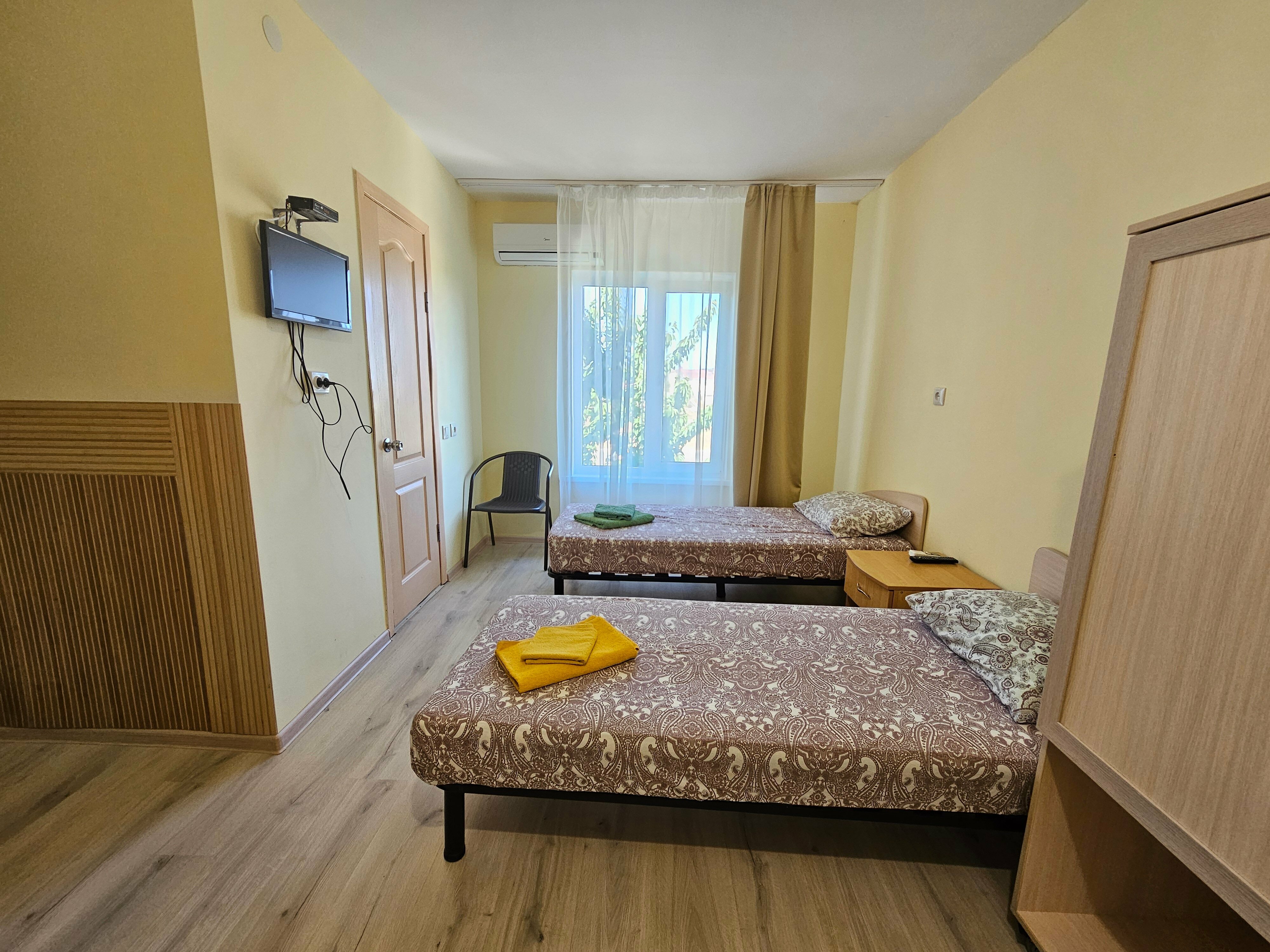 Двухместный номер эконом-класса с 2 отдельными кроватями