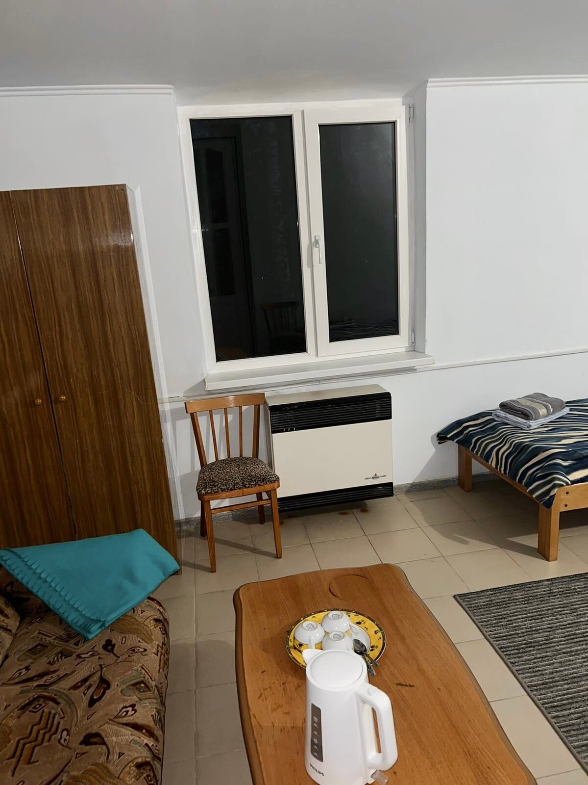 Четырехместный номер с собственной ванной комнатой вне номера