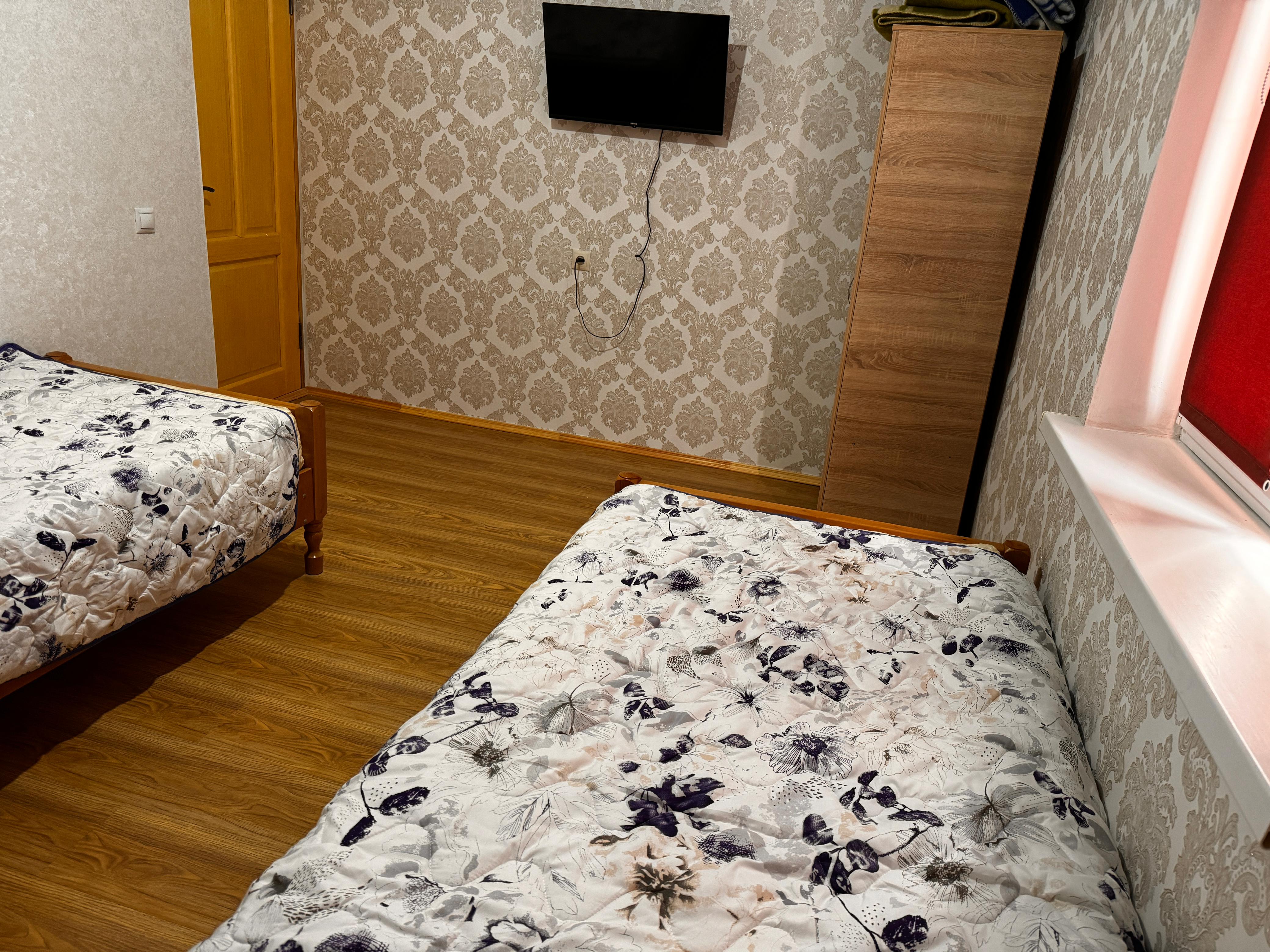 Двухместный номер эконом-класса с 2 отдельными кроватями