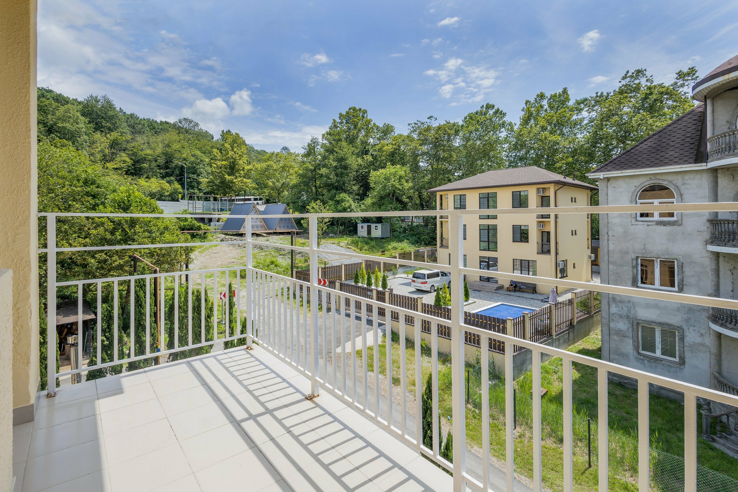 Трехместный номер с балконом