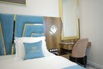 Номер делюкс с 1 двуспальной кроватью в MaxWell Hotel & SPA