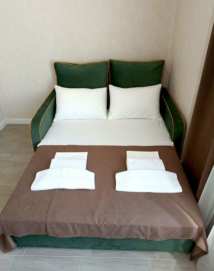 Четырехместный номер с выходом во двор