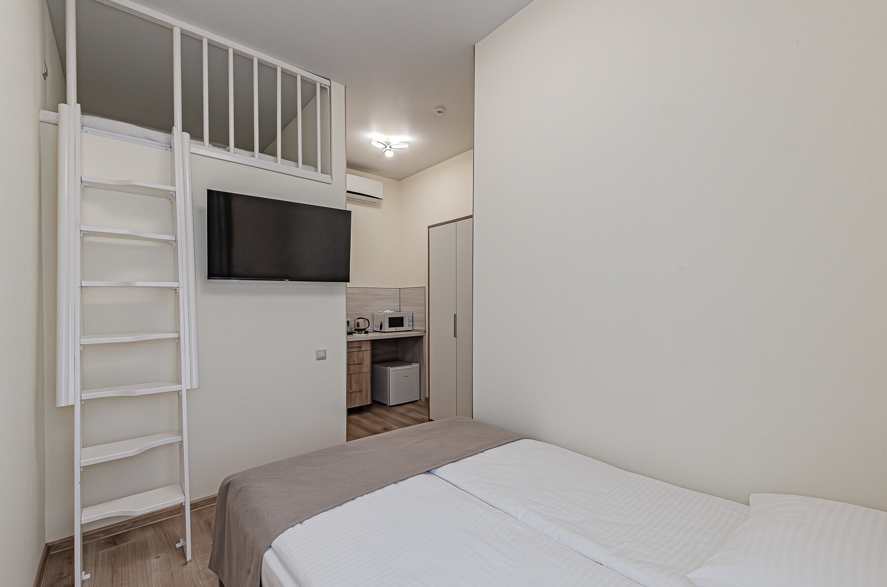 Двухуровневый номер-студия