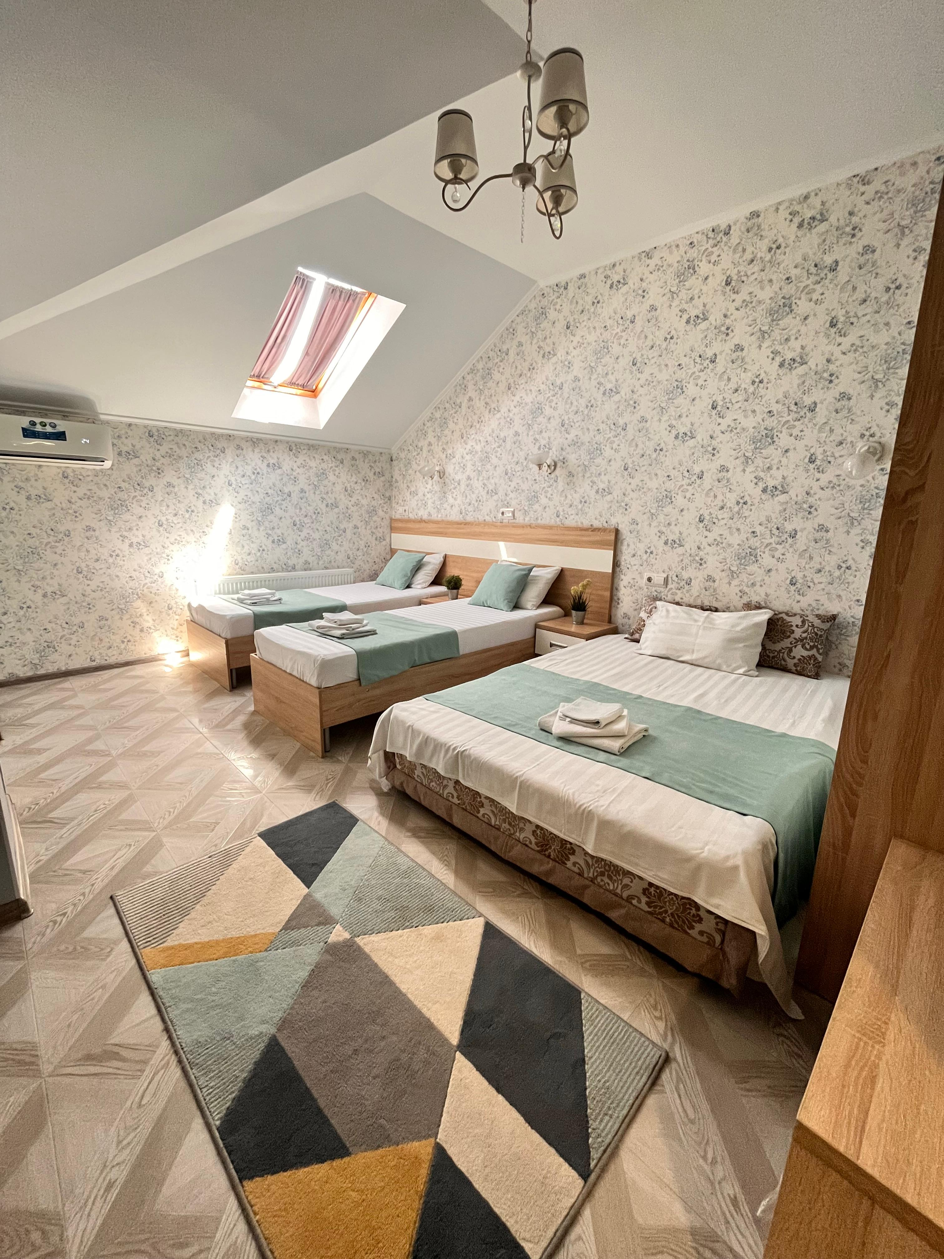 Трехместный номер Делюкс